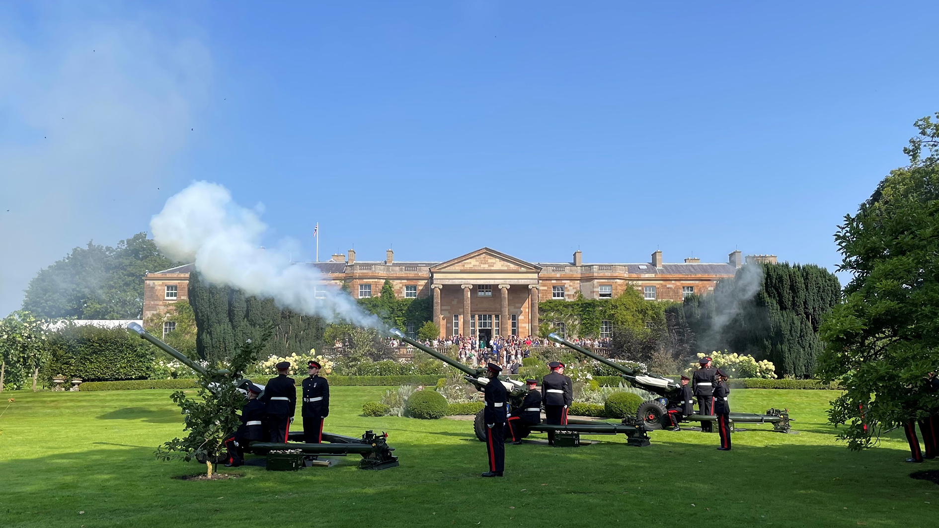 Members of the Army reservists from 206 (Ulster) Battery, 105 Royal Artillery fire a 21 gun salute to mark Accession Day