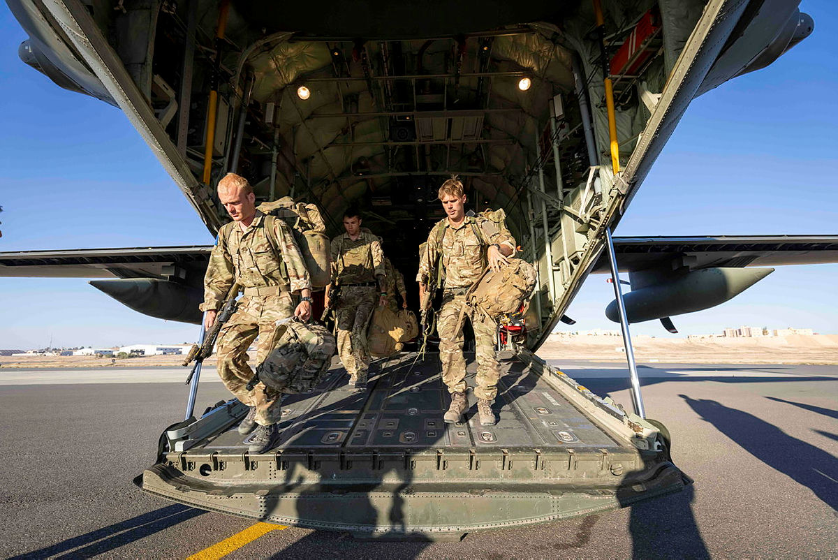 Members of the Army’s Parachute Regiment disembark from a Hercules