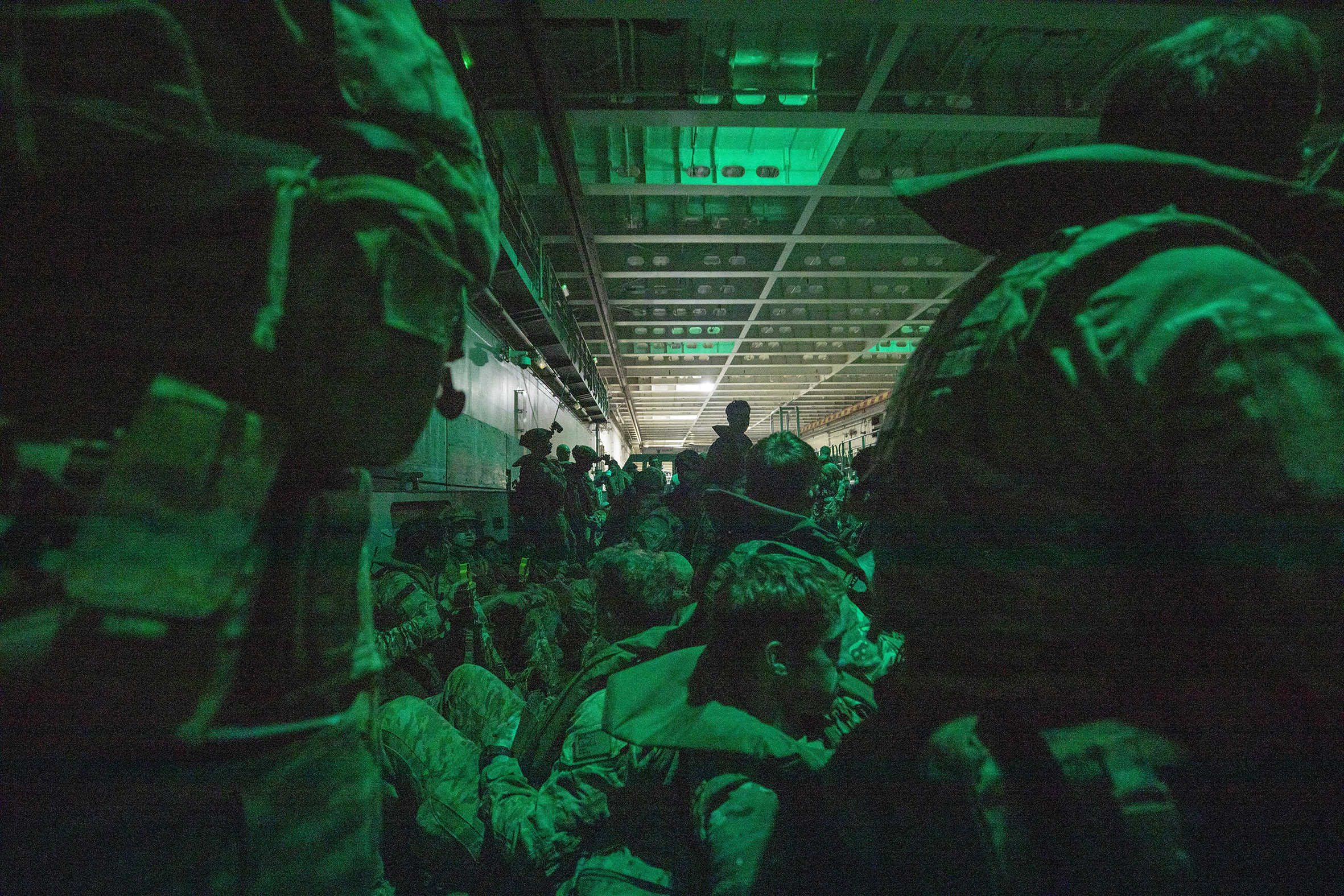 Men of 40 Commando are packed in an Australian landing craft ready for the dawn raid whilst taking part in Australia's biggest military exercise