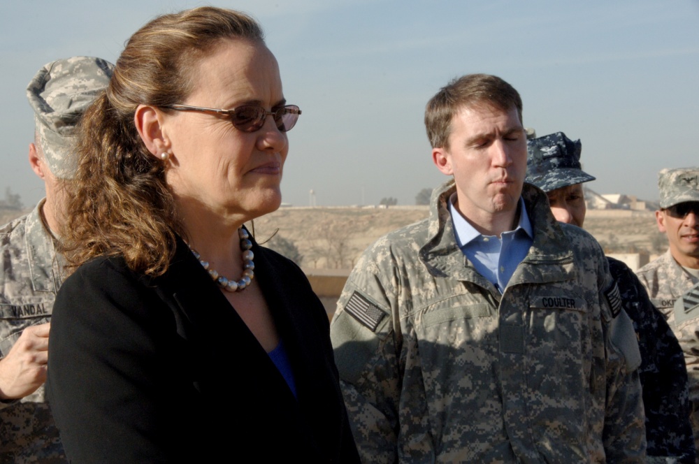 Michele Flournoy, as Under Secretary of Defense for Policy, listens to introductions as she arrives at a combined checkpoint training site on Forward Operating Base Marez, near Mosul, Iraq 