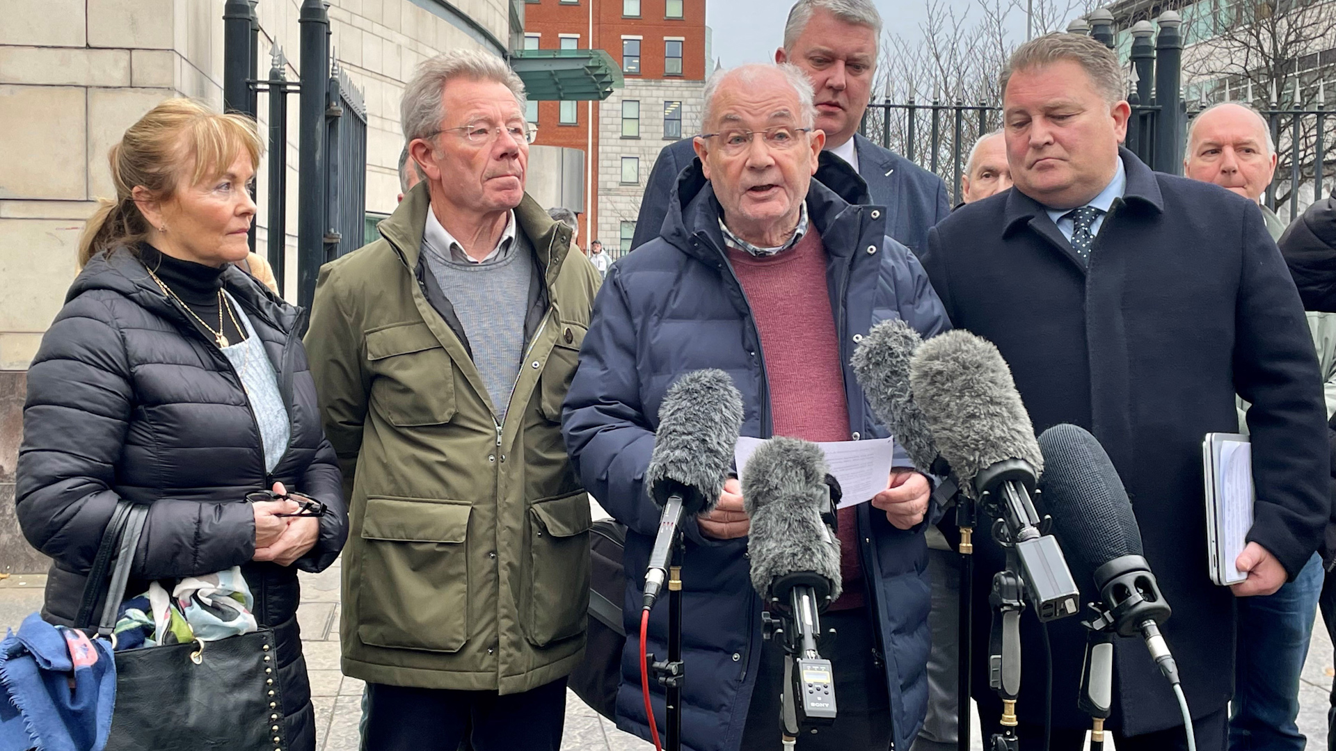 Mickey McKinney, brother of William McKinney, speaks to the media