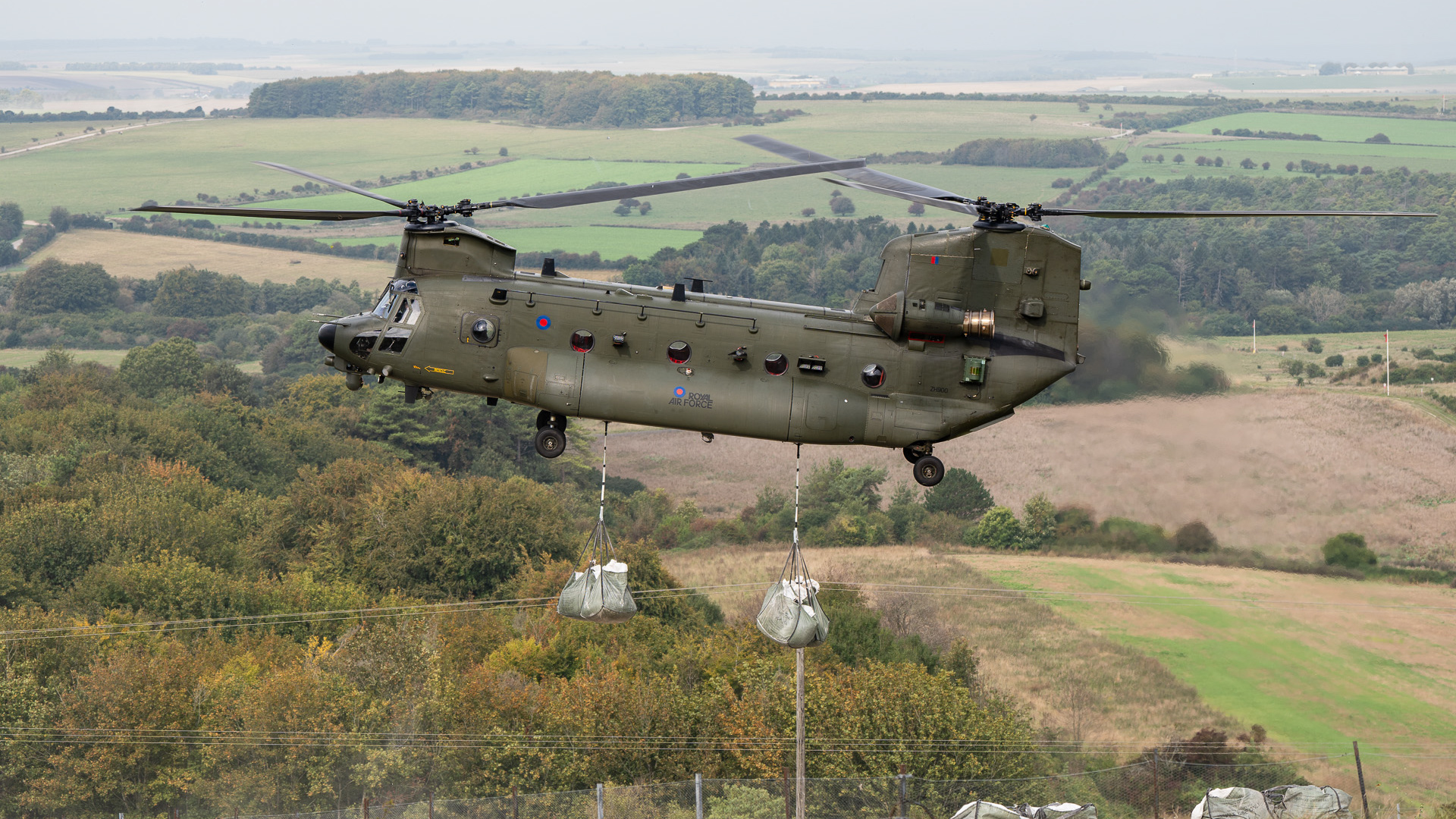 RAF Chinook drops 100 tonnes of chalk during restoration of Bulford Kiwi