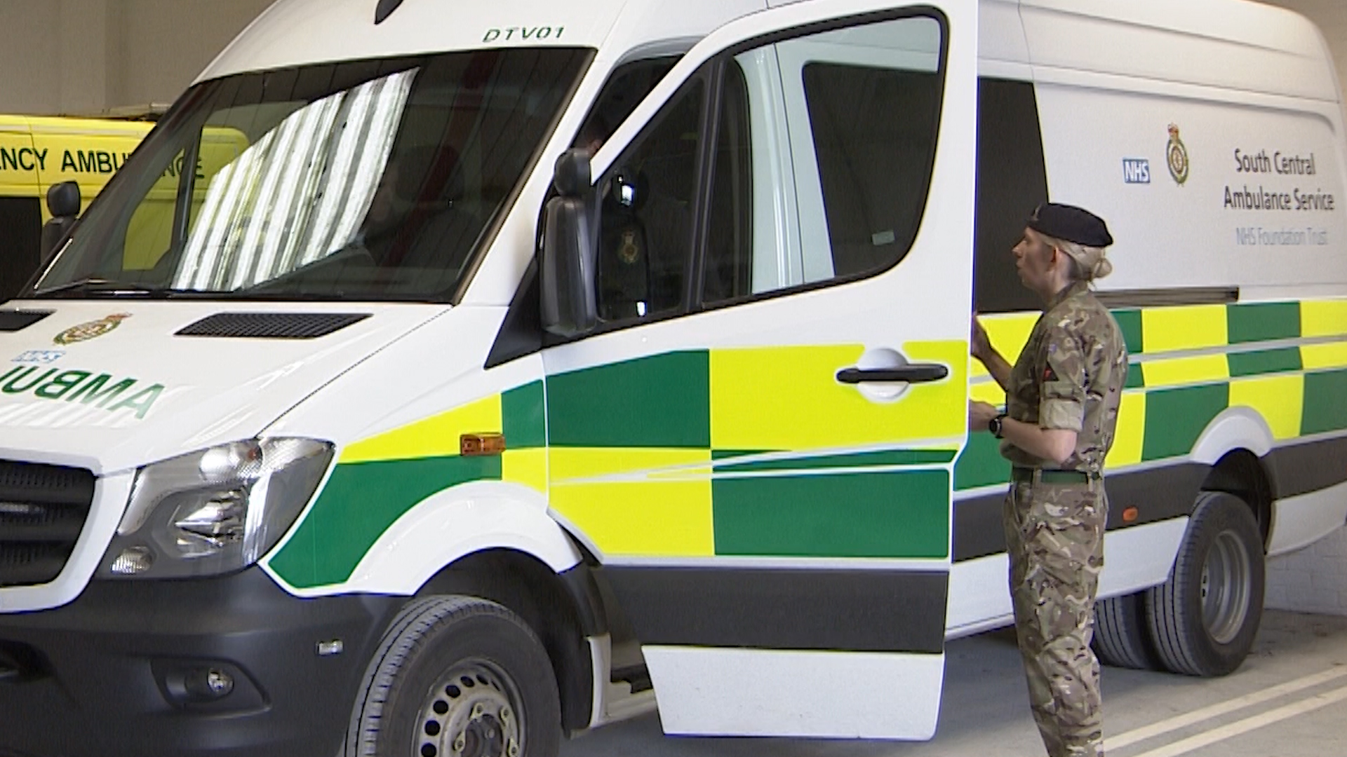 Military Personnel Help Drive Ambulance 310320