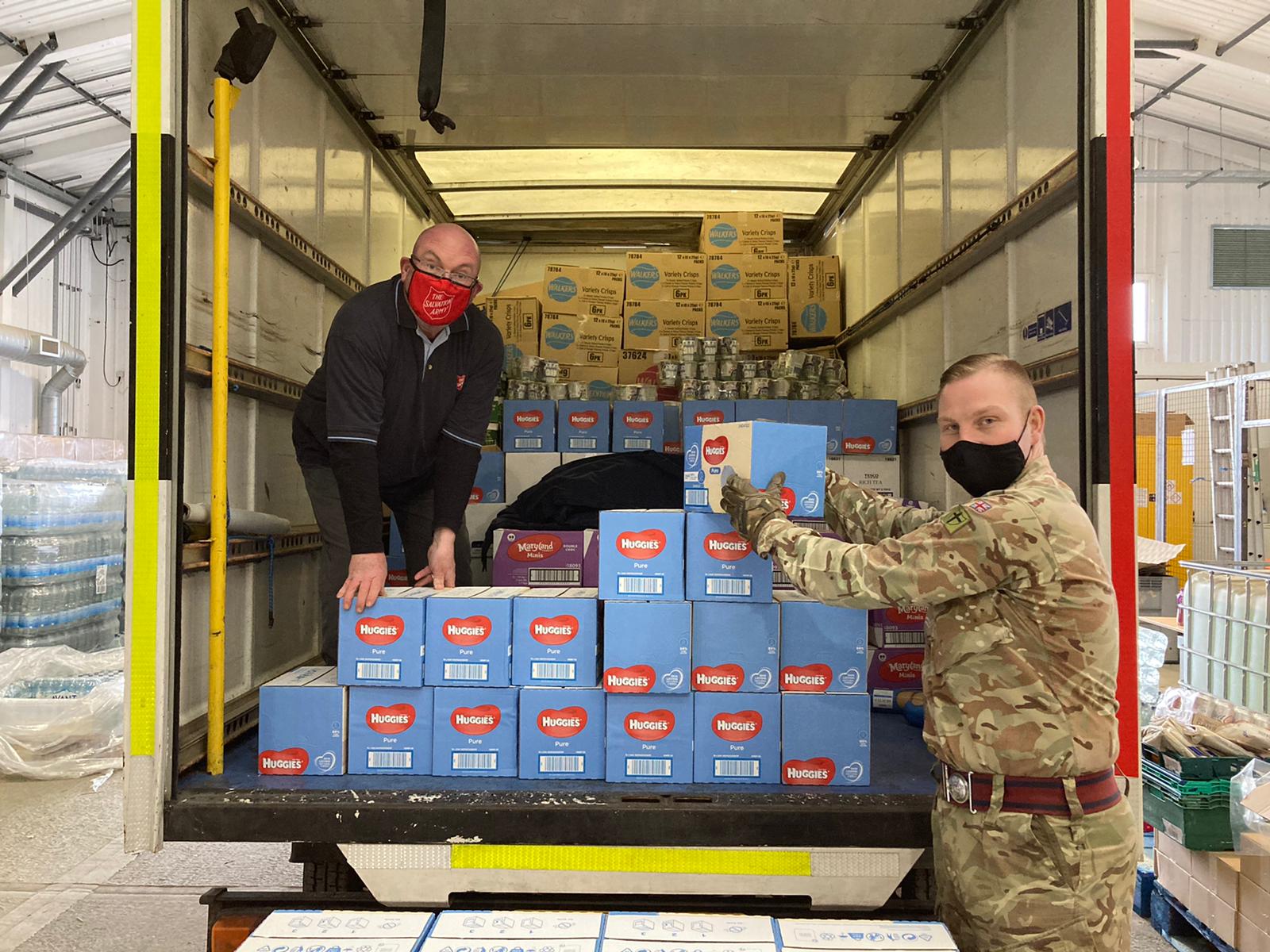 Military personnel partnered with local charities to deliver community care packages in Kent