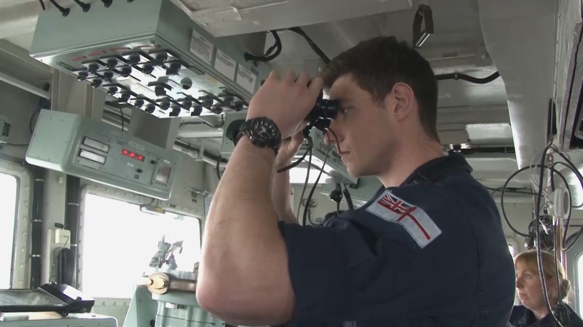 Royal Navy Minehunter officer keeps watch