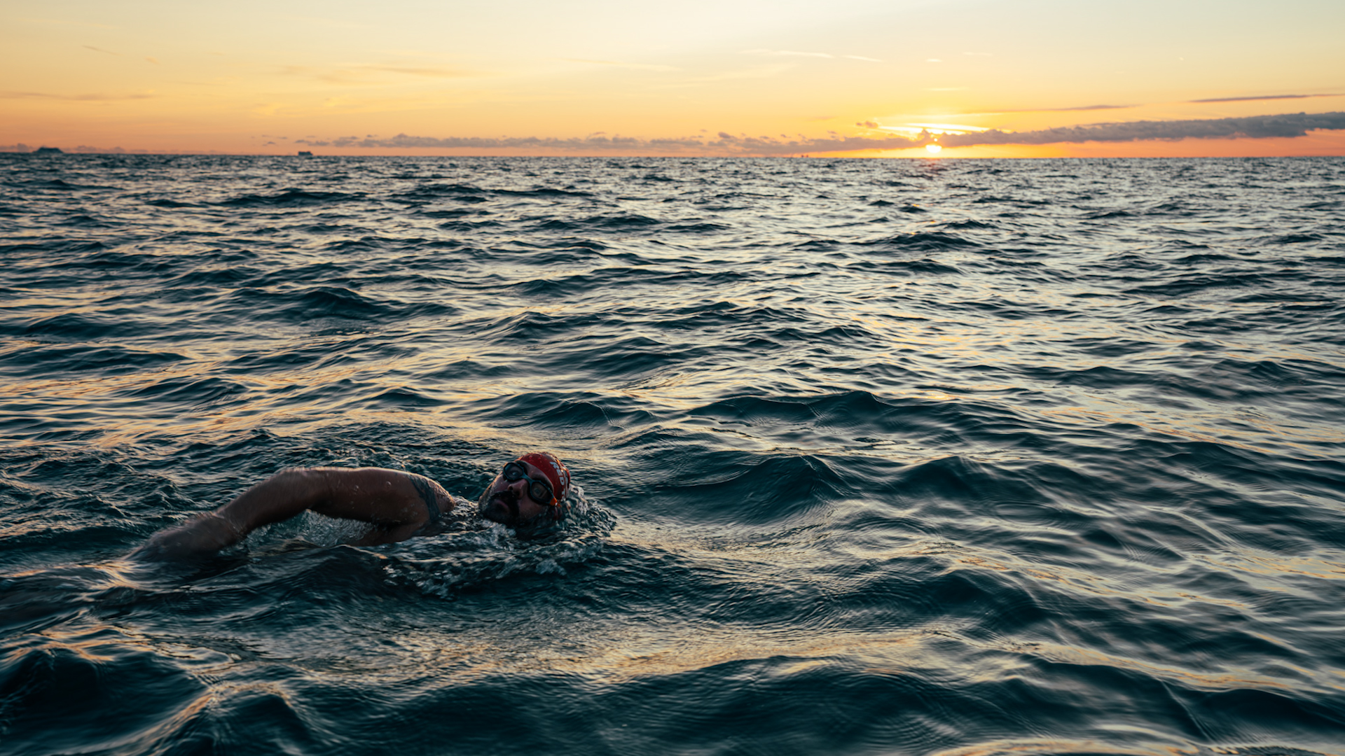 Mitch Hutchraft swimming Channe