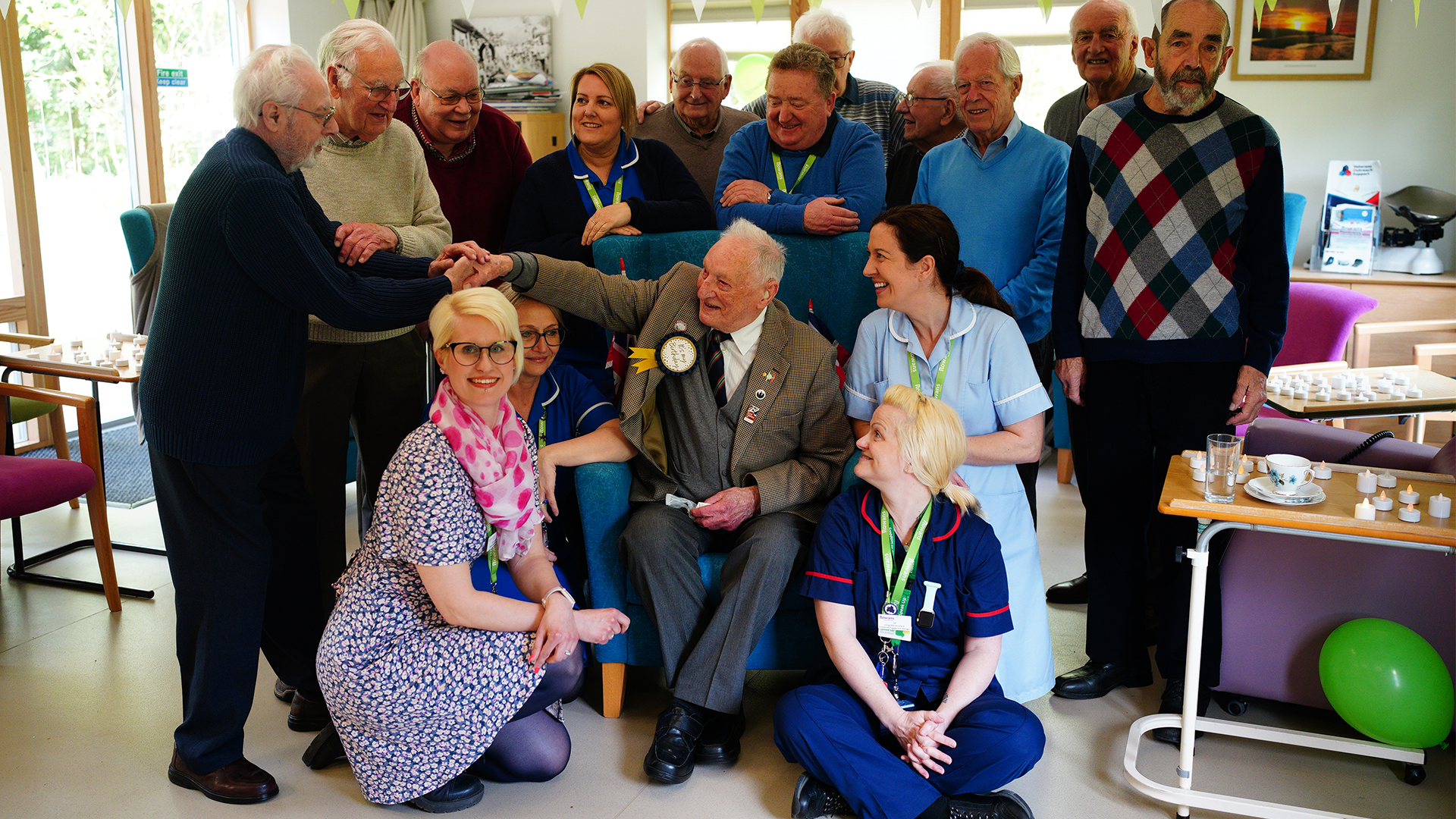 Mr Grubb celebrated with his friends, and staff and volunteers during a party at Rowans Hospice Living Well Centre in Waterlooville, Hampshire 150424 CREDIT PA MEDIA