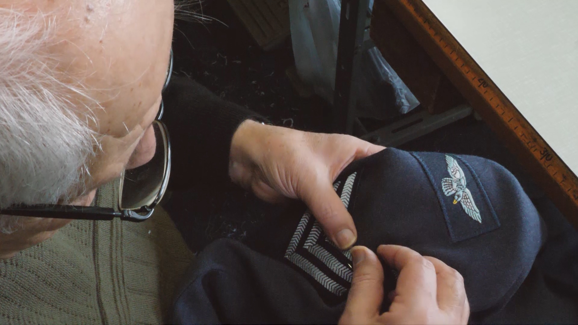 Mr Kasinis sewing military uniforms 130219 CREDIT BFBS