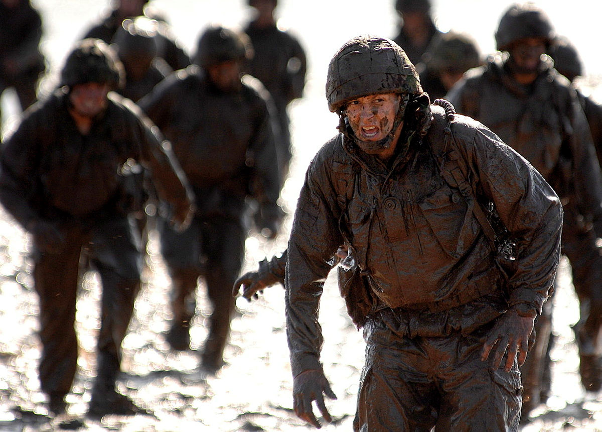 Royal Marines recruits doing the mud run as part of their basic training and selection