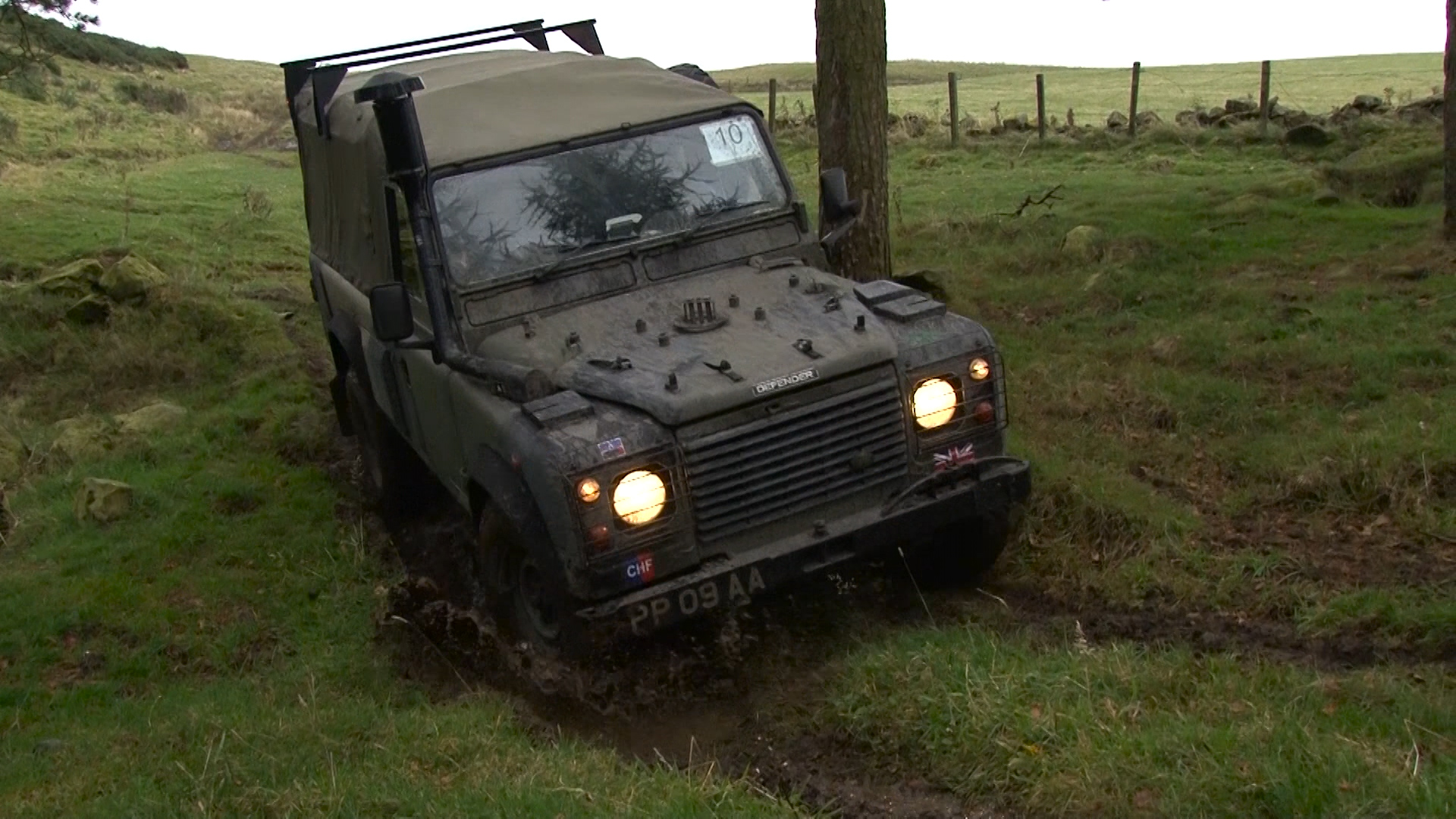A Land Rover jeep on exercise Mudmaster in Scotland