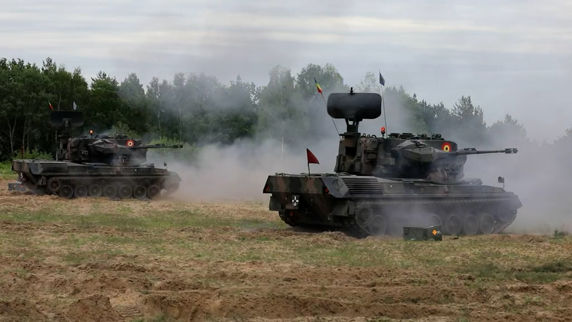 Troops part of a Nato battlegroup conduct a live-fire exercise 