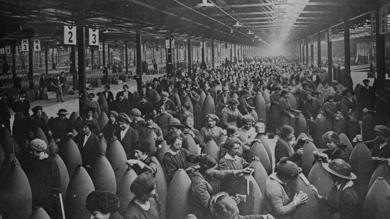 Munitionettes  in January, 1917, amongst large artillery shells in a munitions factory (PA images)