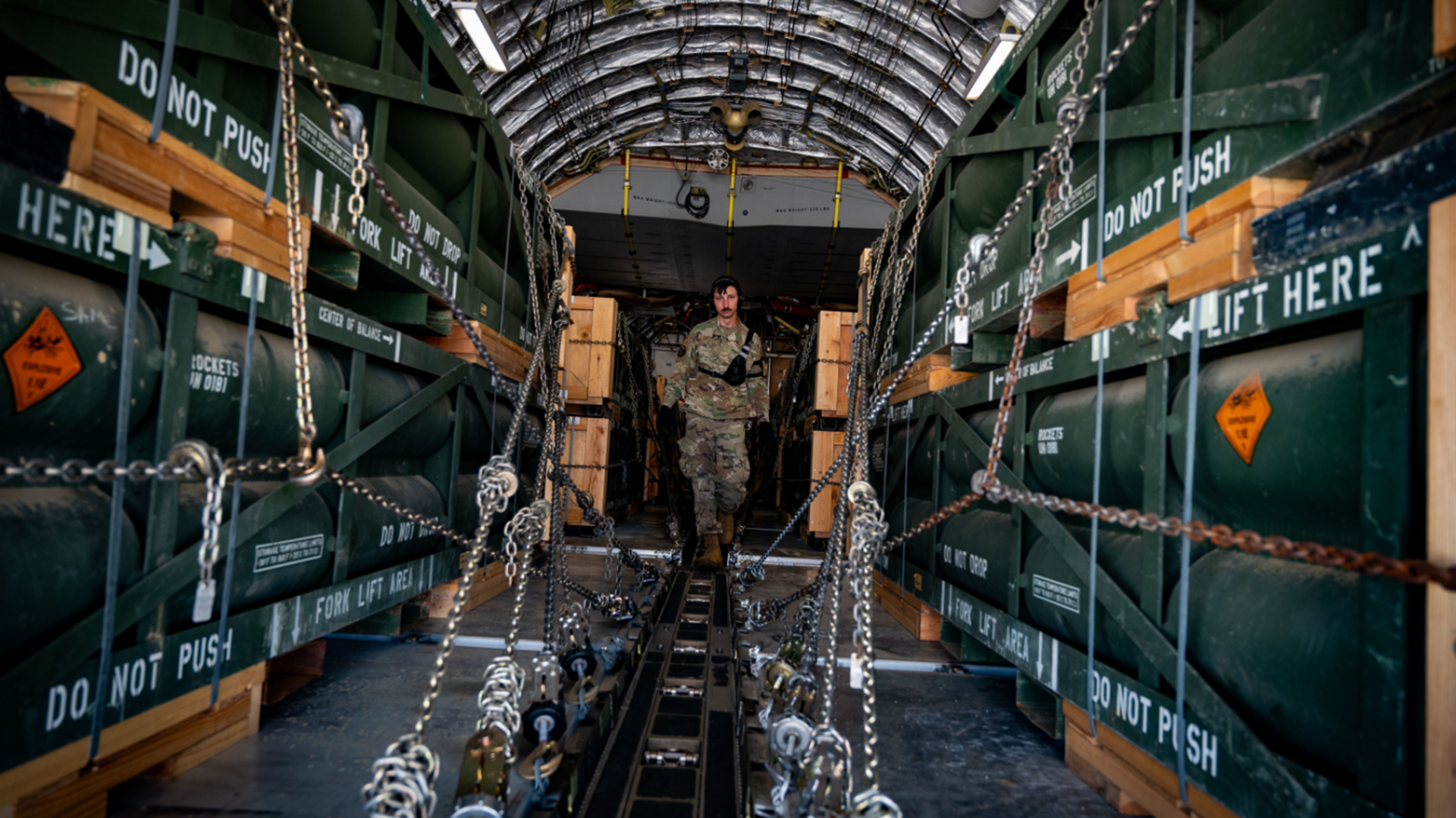 An airman with the 305th Aerial Port Squadron uploads munitions onboard a C-17 Globemaster III at Joint Base McGuire-Dix-Lakehurst, N.J, as part of an additional security assistance package for Ukraine (Picture: Dept of Defence)