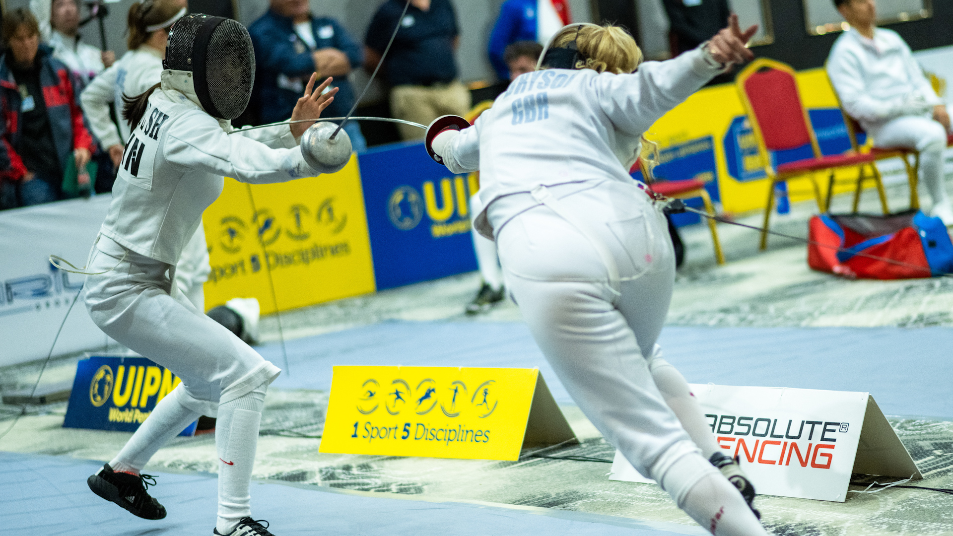 Kerenza Bryson competes in fencing