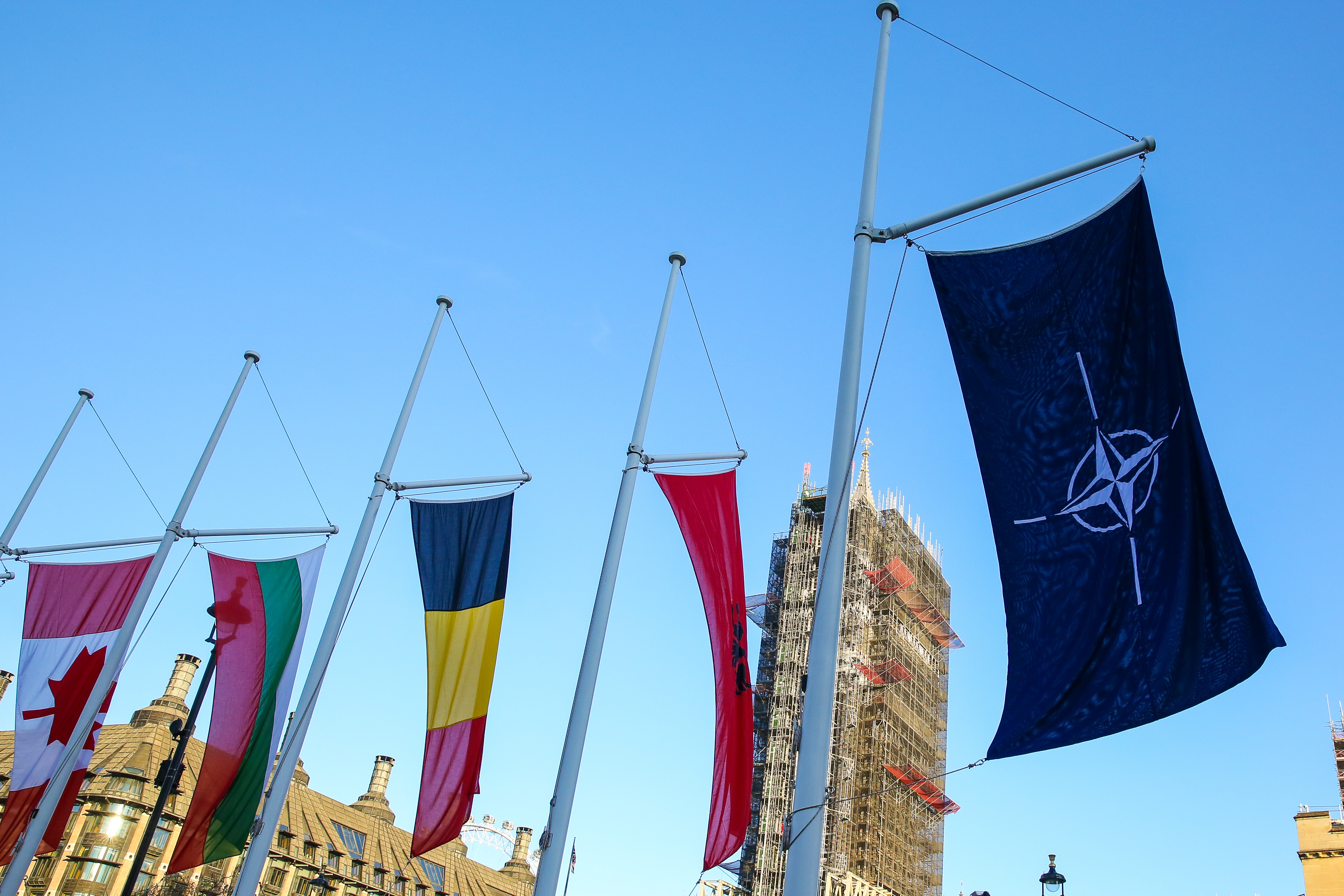 NATO flag and alliance member flags flying in London's Parliament Square (Picture: PA).