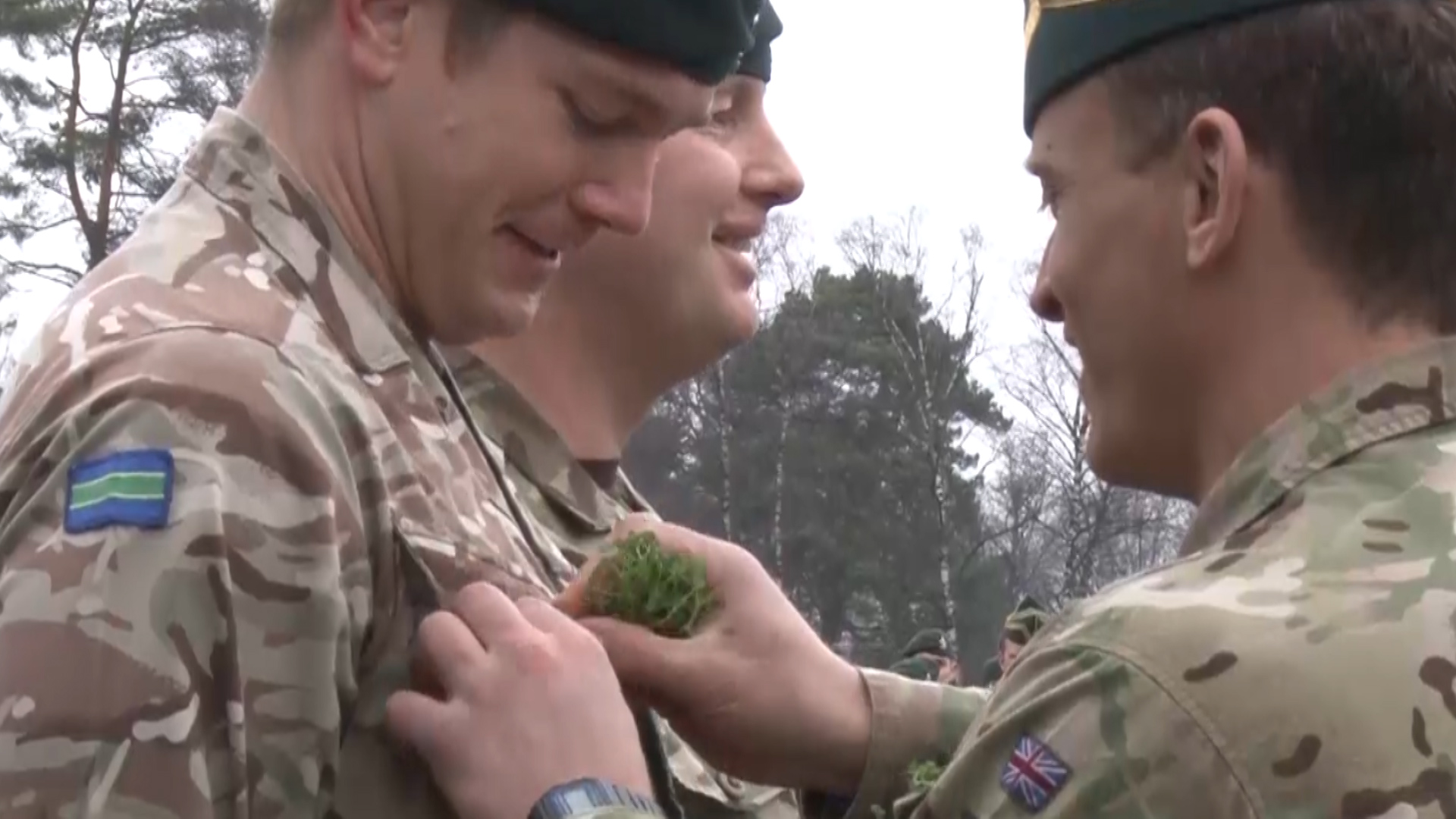QRH are presented with St Patrick's Day shamrocks