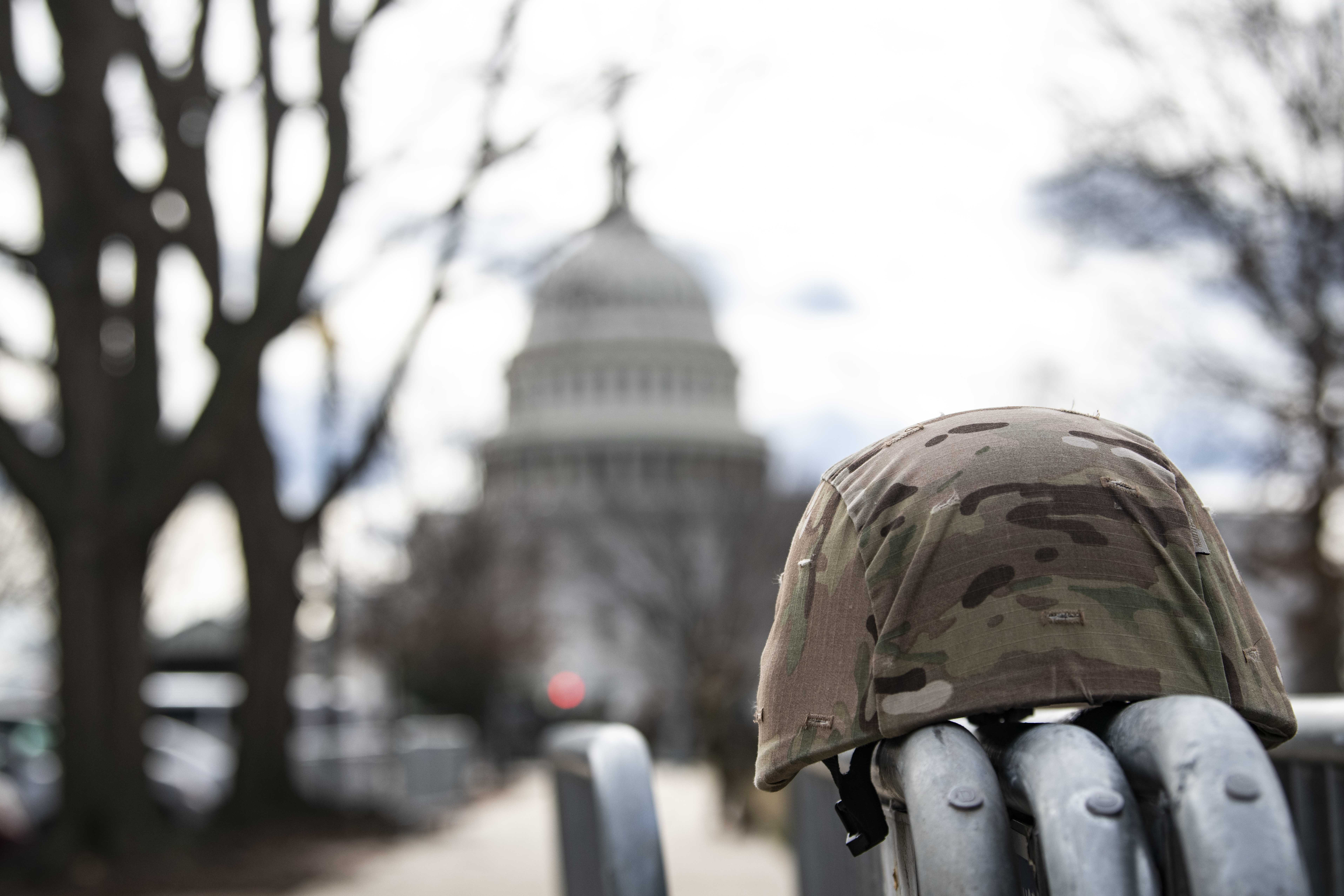 Cover image: National Guard helmet in the grounds of the US Capitol (Picture: USA Today Network/SIPA USA/PA).