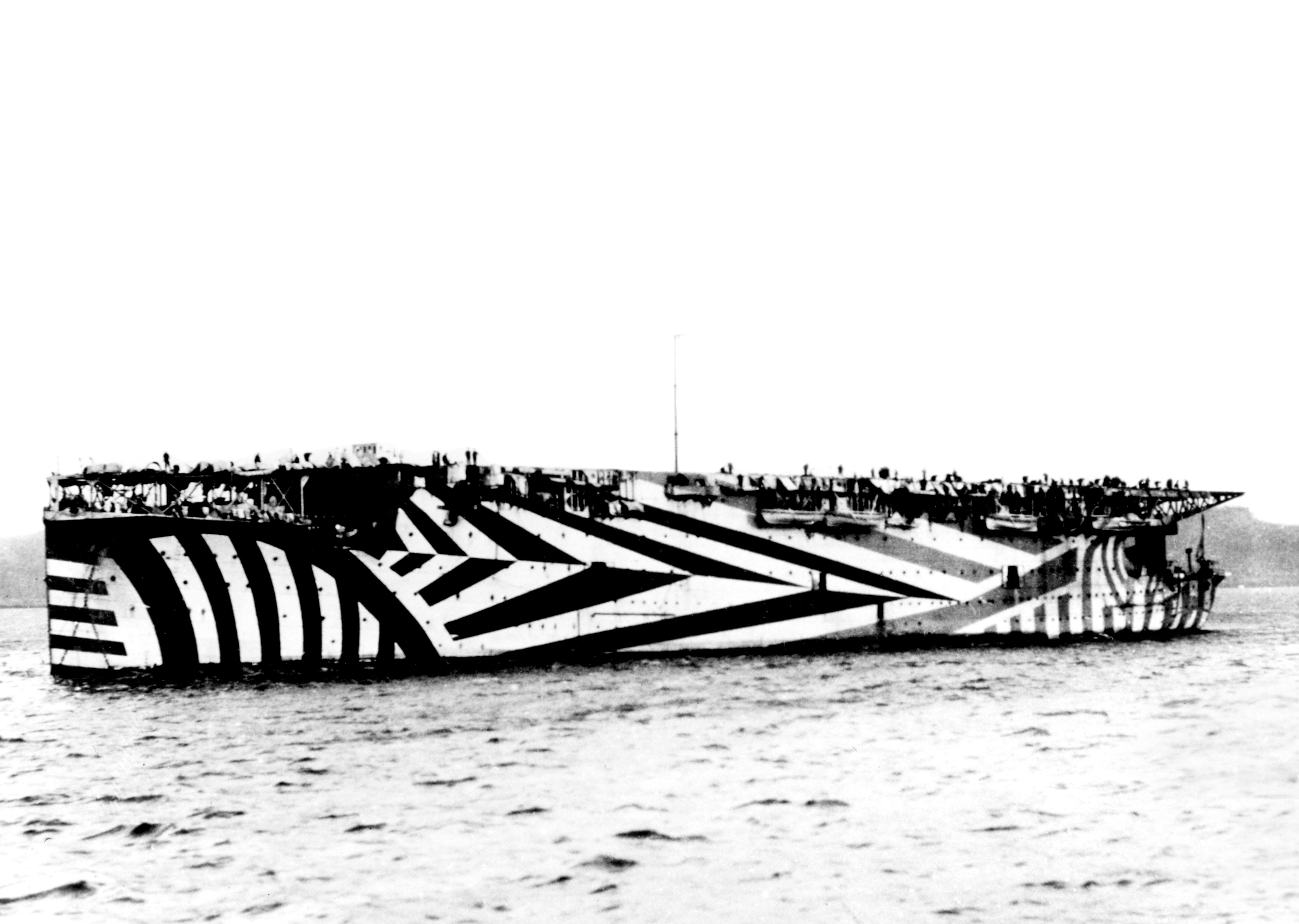Royal Navy aircraft carrier HMS Argus with dazzle camouflage during the First World War in 1918 (Picture: Science History Images/Alamy Stock Photo).