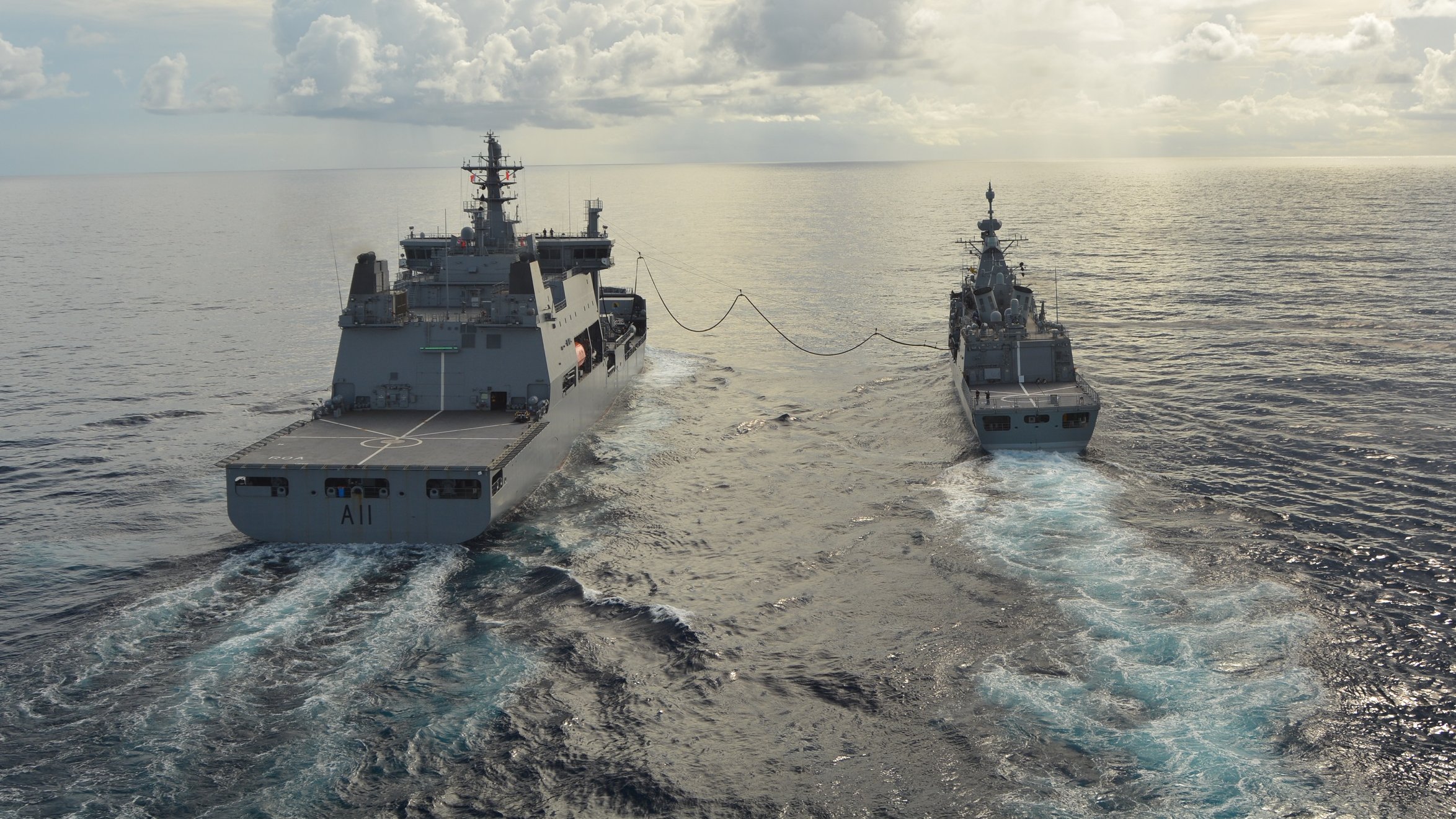 Nearing end of her 3,500NM sail to Guam, HMNZS TeKaha comes alongside HMNZS Aotearoa for a top up of 50,000 litres. 22092021 Credit Royal NZ Navy.jpeg