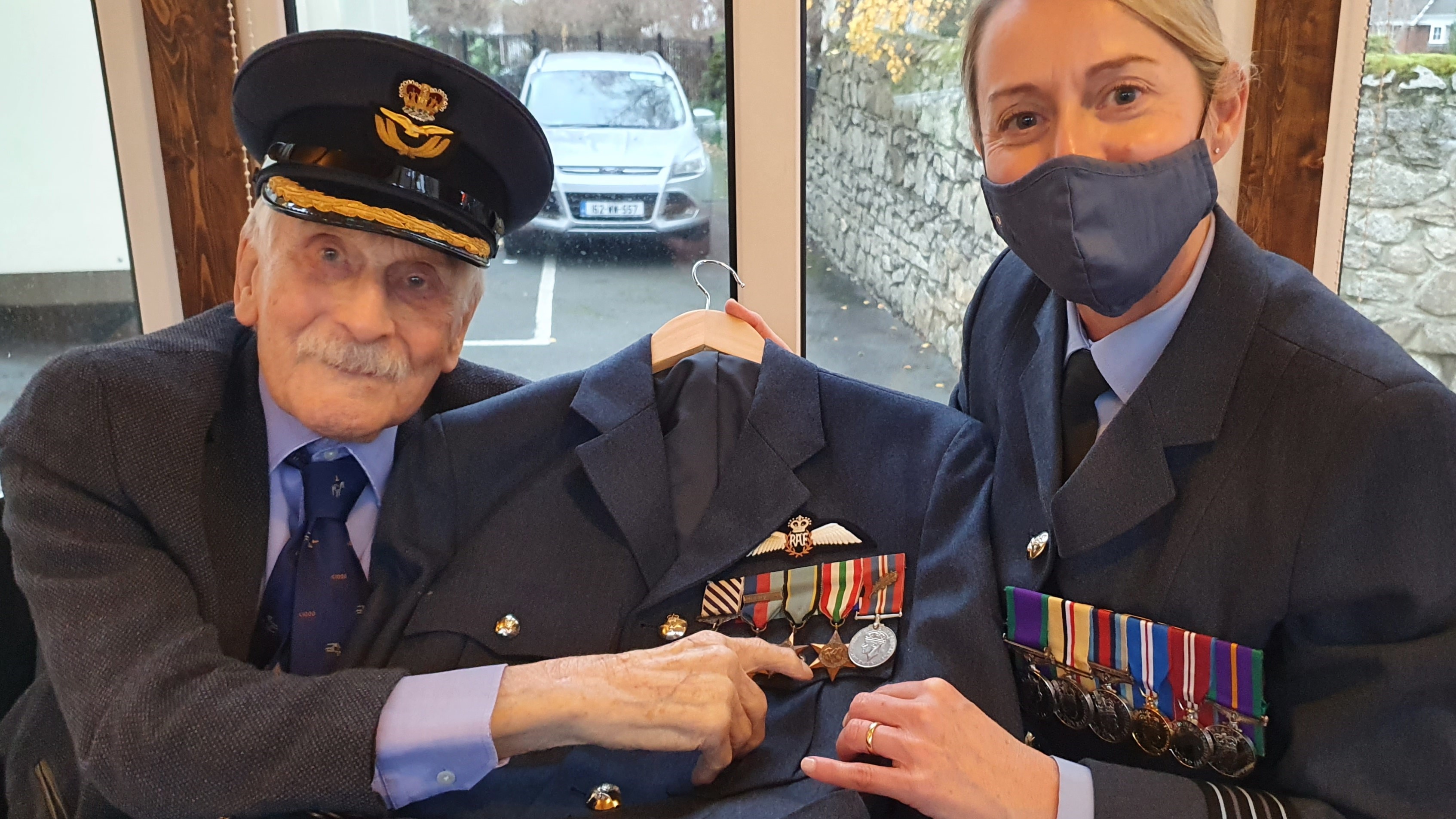 New Uniform Xmas gift delivered to Last Battle of Britain pilot Capt Hemingway 21122021 CREDIT RAF