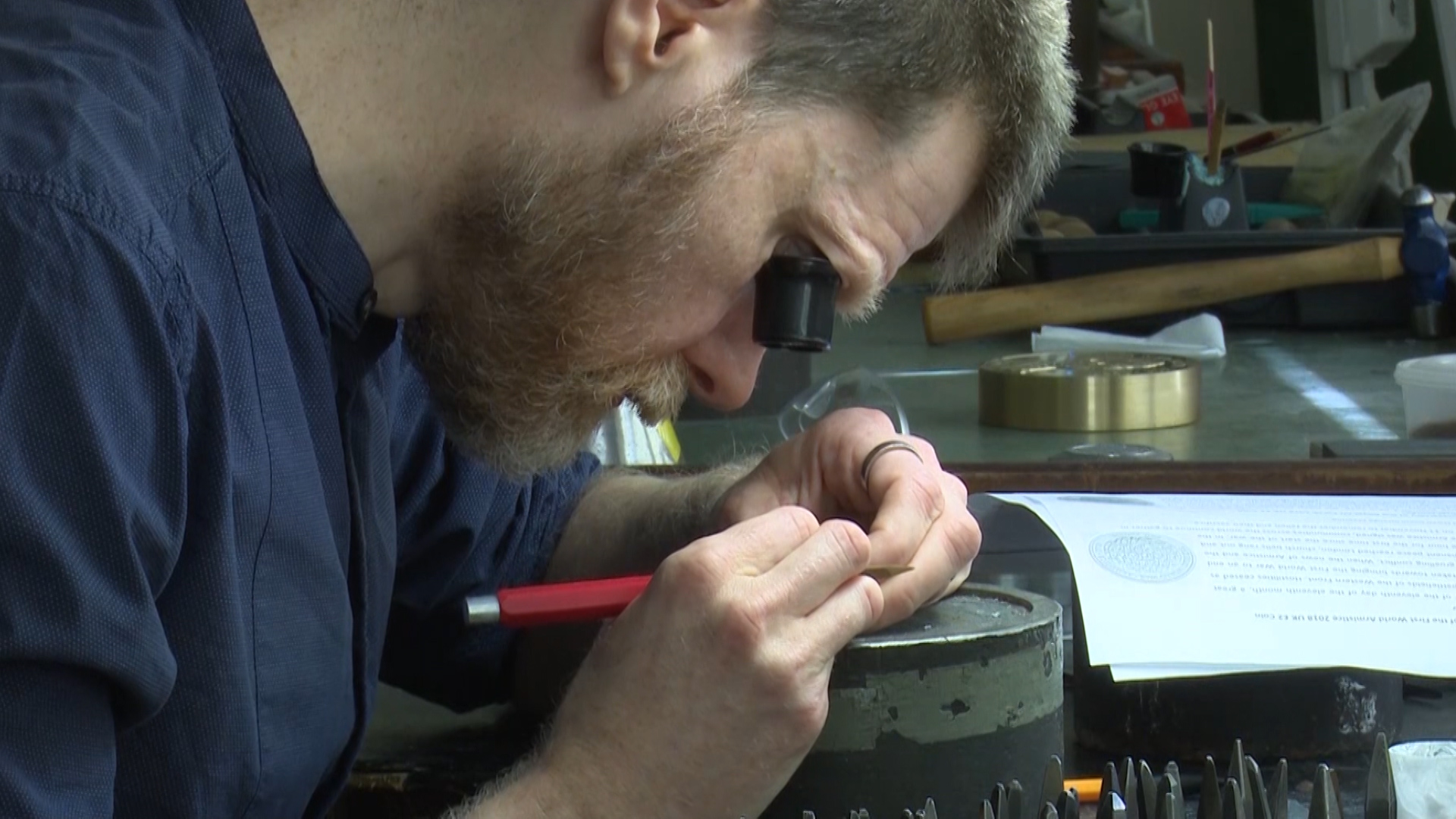 Royal Mint design manager working on special RAF coin