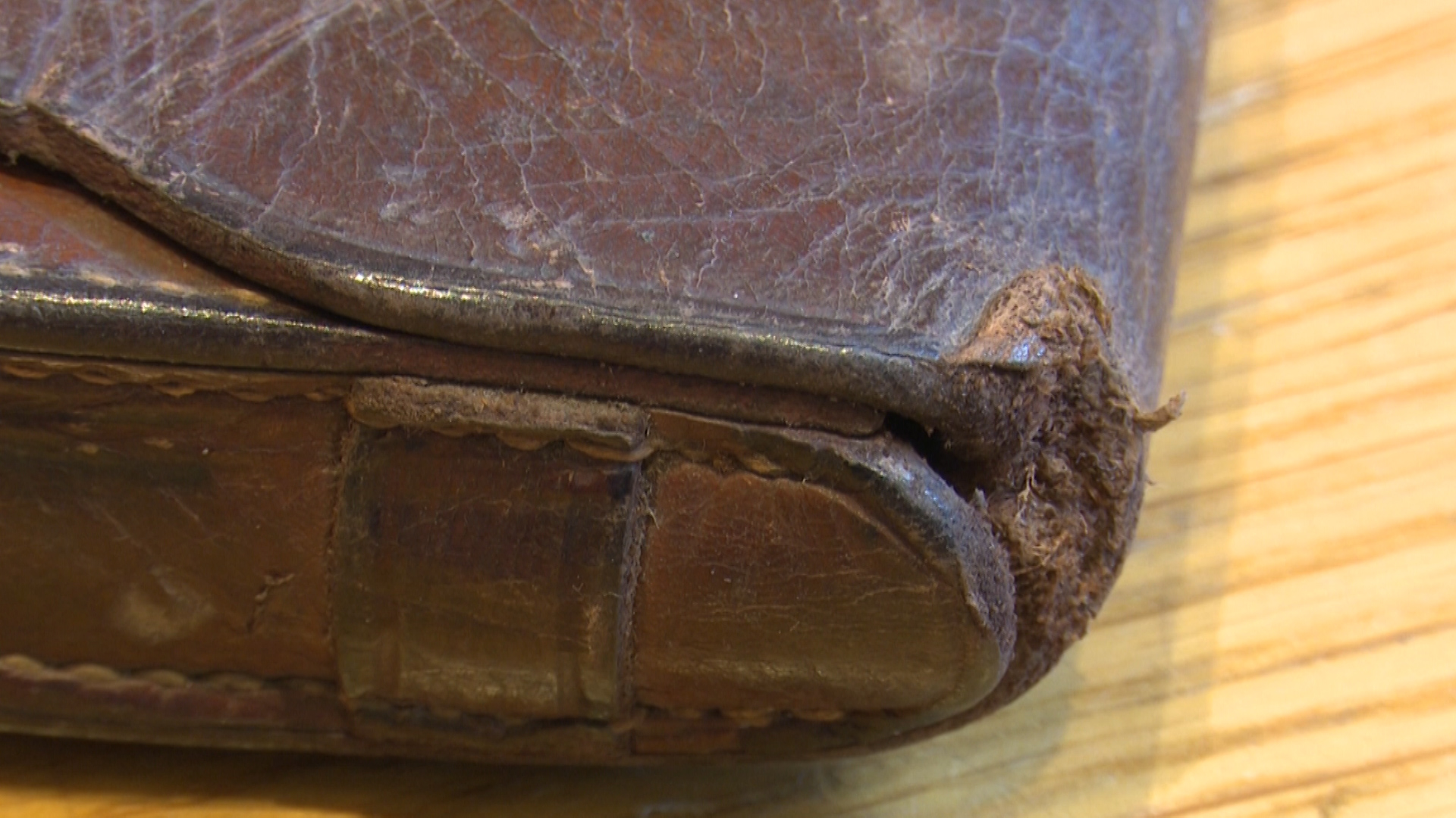 Bullet mark on leather compass case of Sydney Day VC