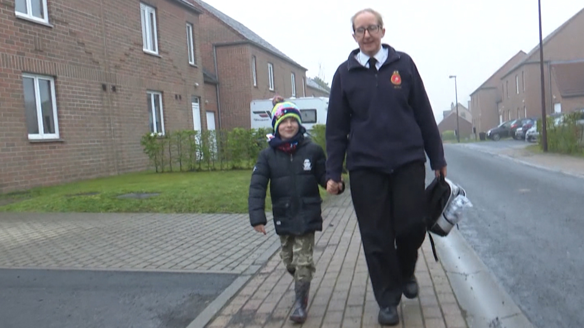 Nicola Window walks with son Henry.