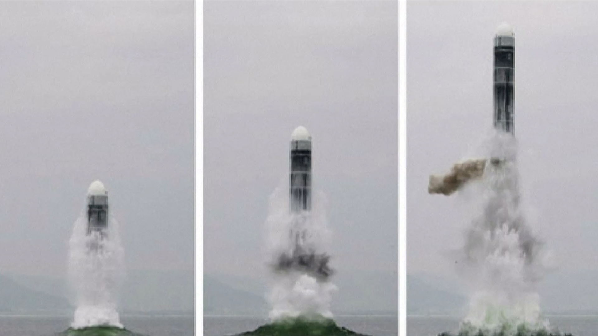 The Pukguksomg-3 breaking the sea surface during the test (Picture: KCNA).