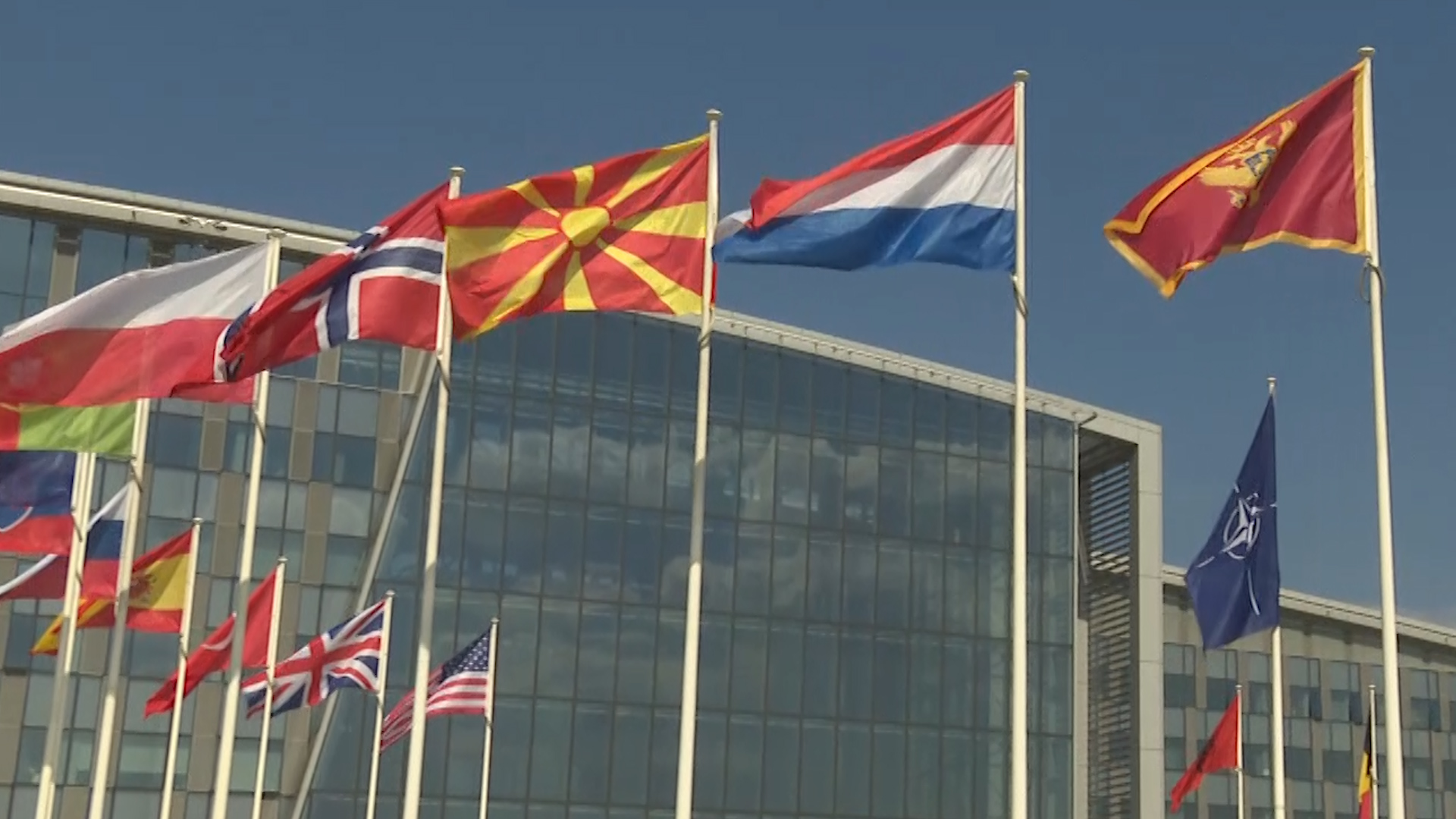North Macedonian flag alongside other alliance flags outside (Picture: NATO TV).