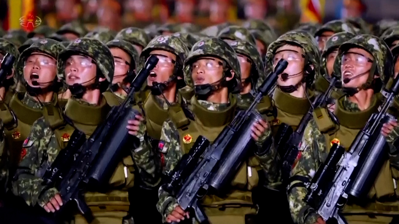 Members of the North Korean's 11th Corps parading in front of leader Kim Jong Un (Picture: Reuters)
