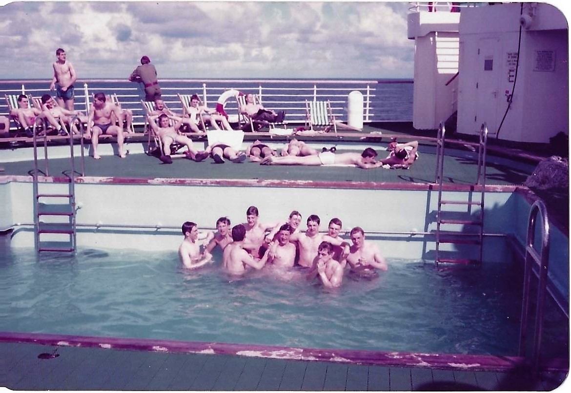 Onboard SS Canberra soldiers relaxing at Officer's pool en route to Ascension. Credit: Kevin Lambert