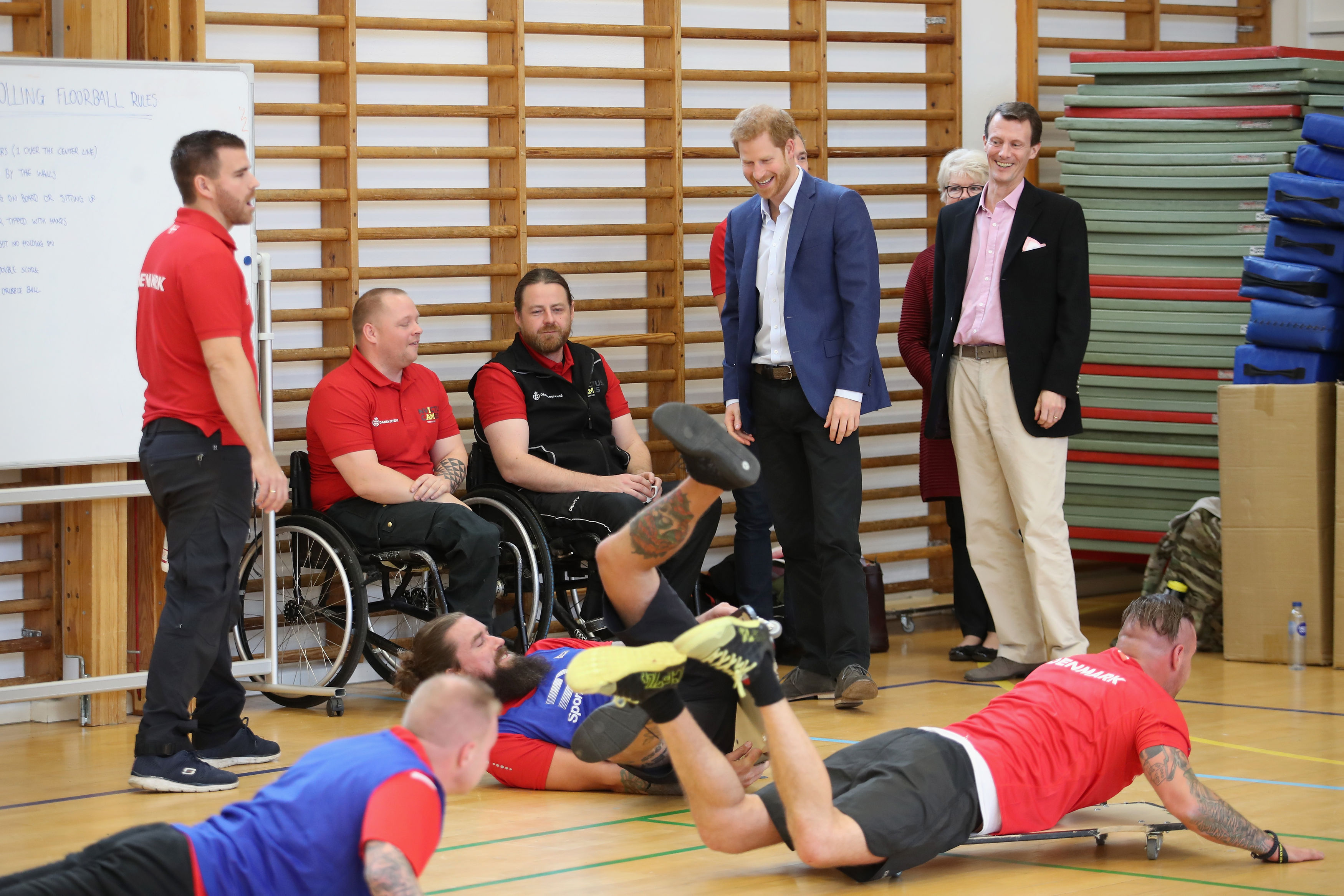 Prince Harry and Prince Joachim of Denmark watch a Rolling Floorball match - CREDIT: PA Images
