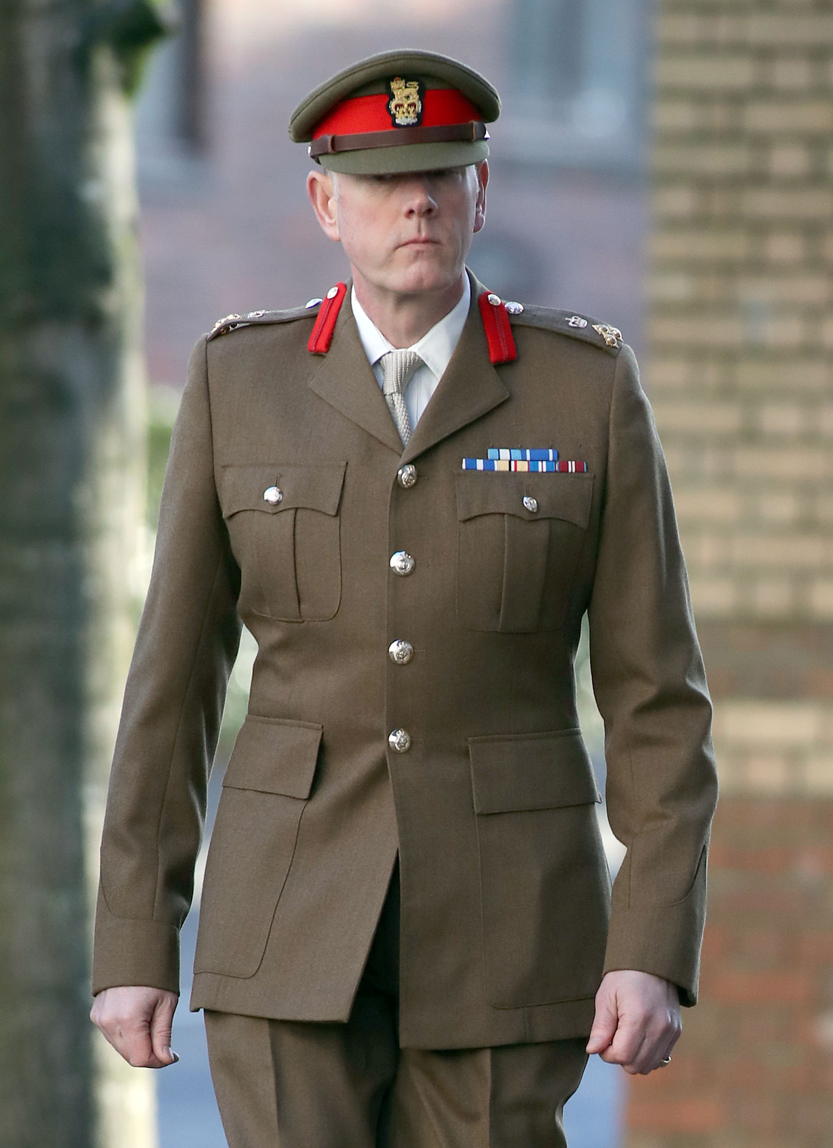 Brigadier Chris Coles arrives at Woking Coroners Court in Surrey to give evidence in the inquest into the death of Private Benton at Deepcut barracks.