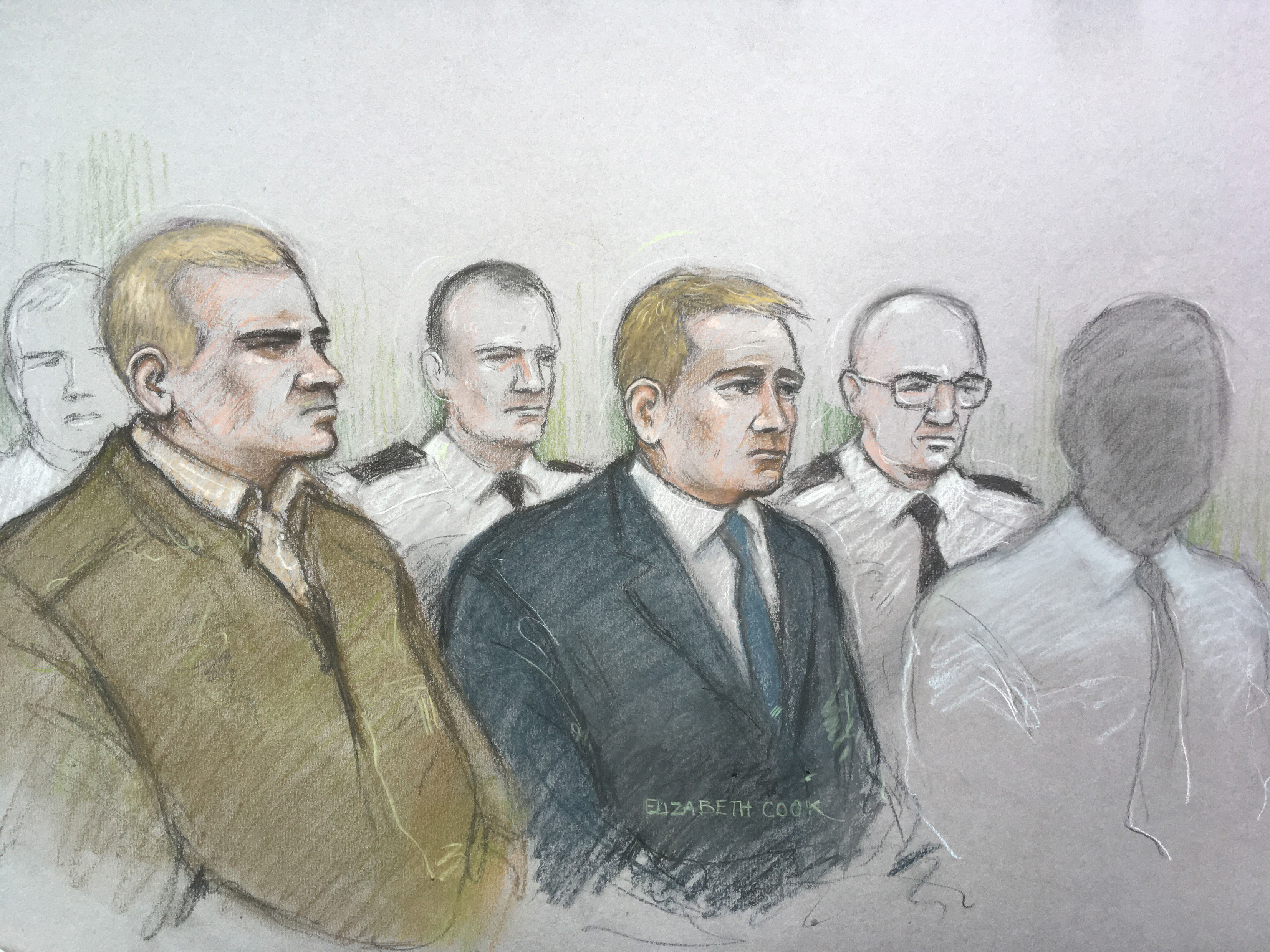 Court artist sketch by Elizabeth Cook of (left) Mikko Vehvilainen and Mark Barrett (centre) on trial at Birmingham Crown Court where they are accused of being part of the proscribed organisation National Action.