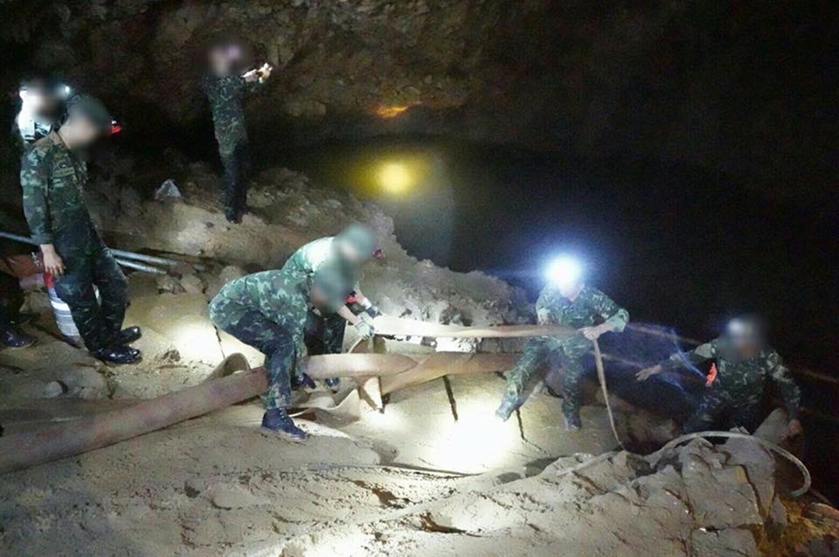 Royal Thai Navy SEALs take part in rescue operation for 12 Thai teenagers and their football coach in northern Thailand's Chiang Rai Province PA