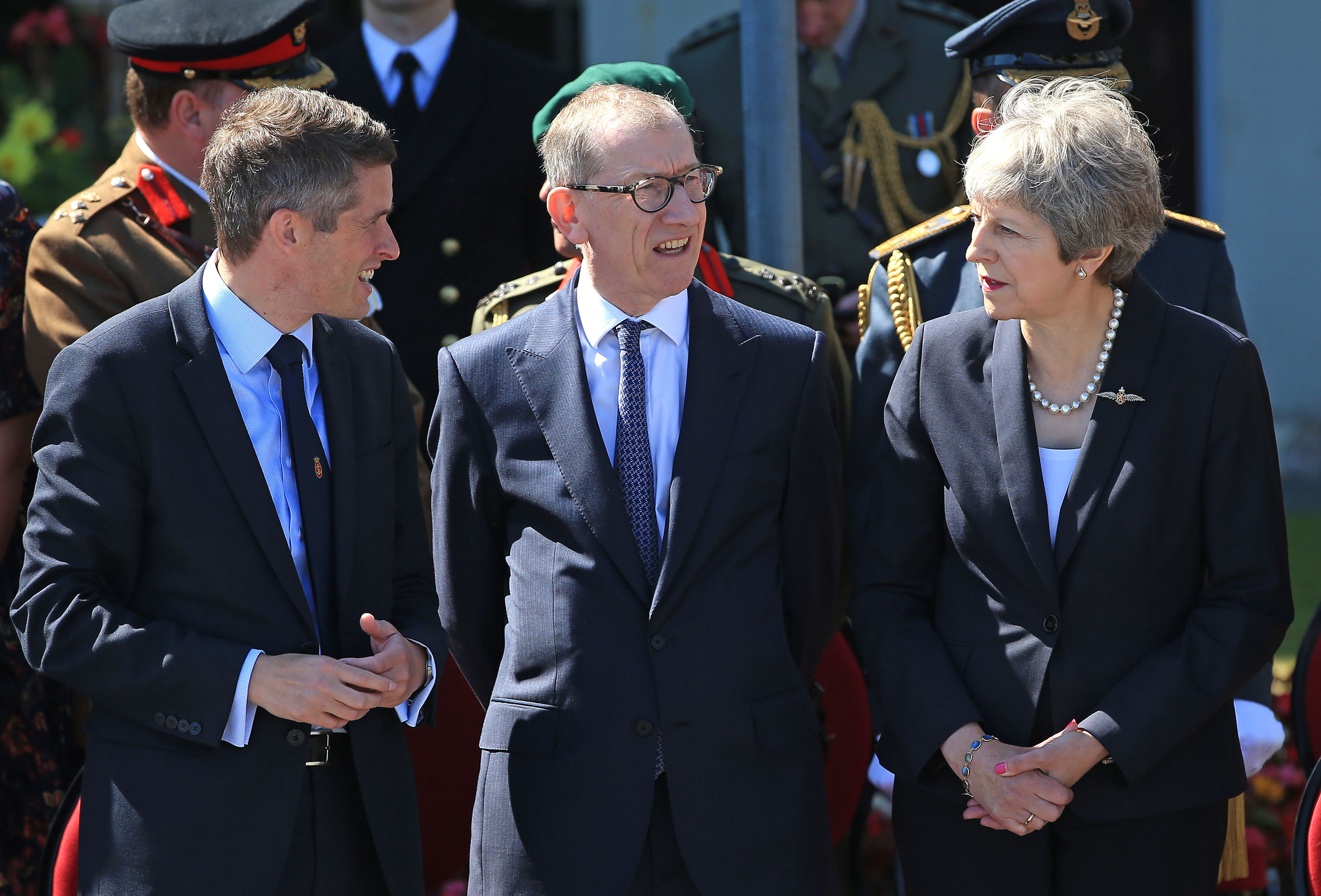 Theresa May, husband and Gavin Williamson at Armed Forces Day in Llandudno