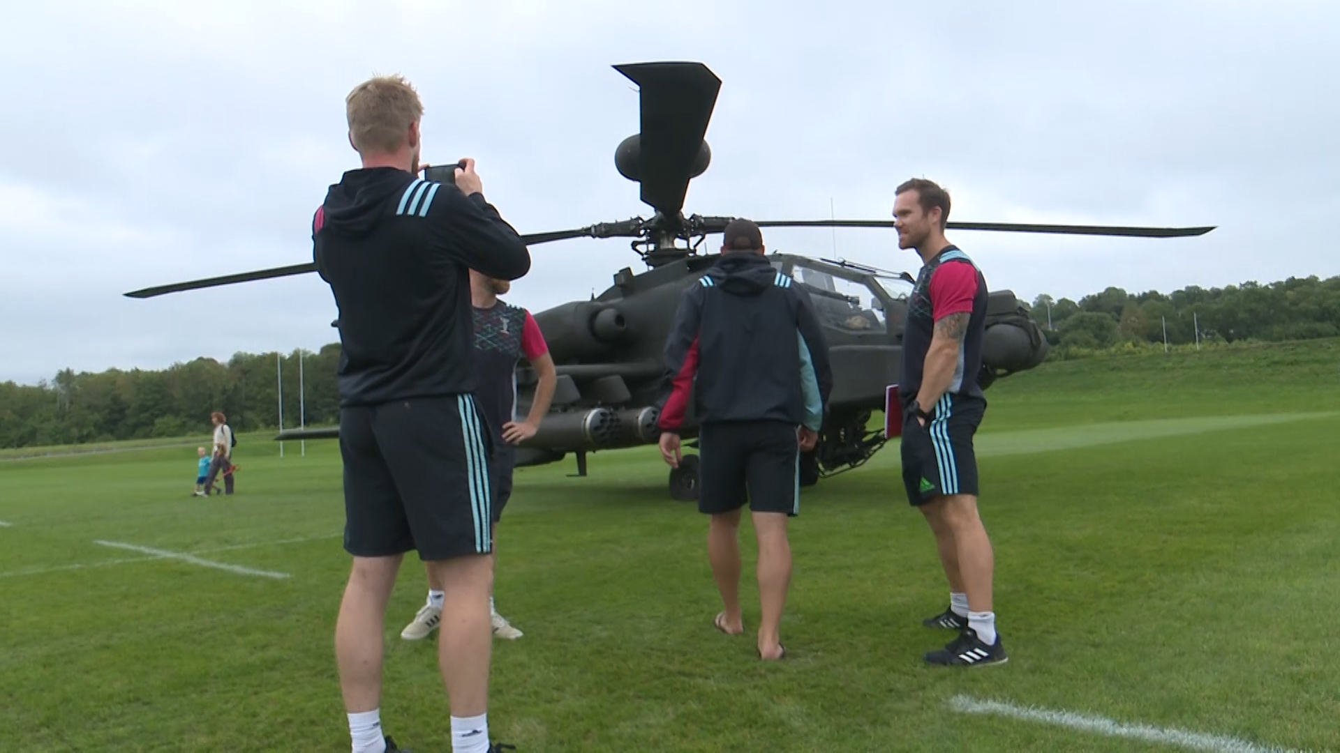 Harlequin players with an Apache.
