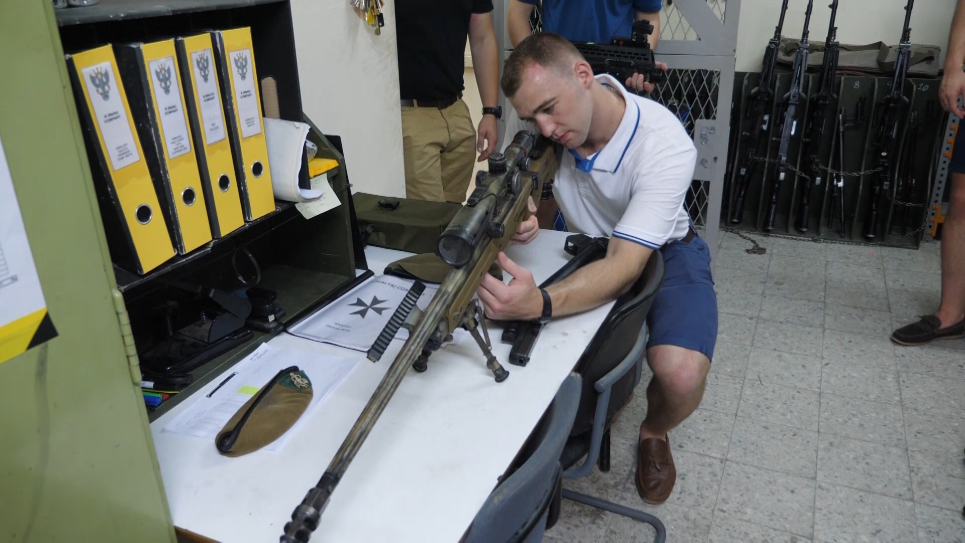 Peter Millward and the group are shown the weapons used by 2 Mercian soldiers.