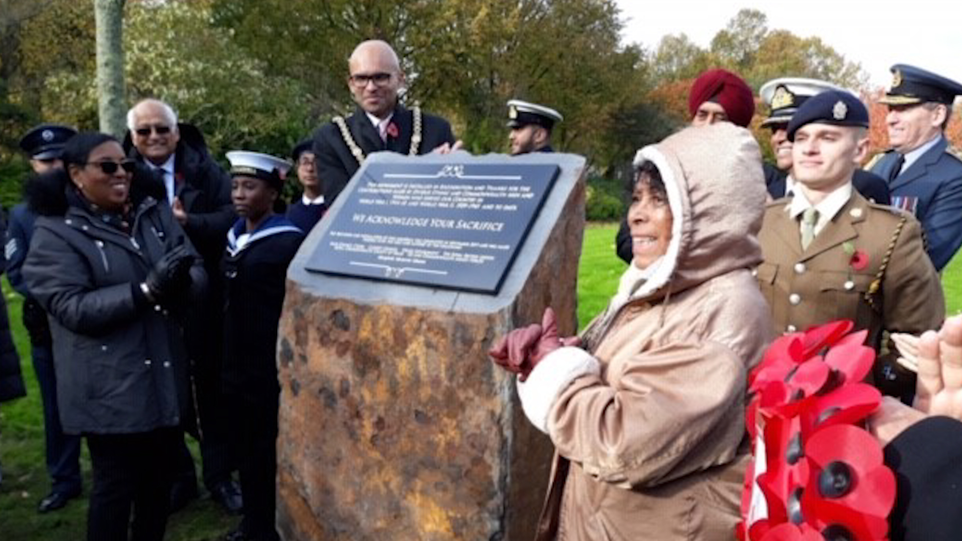 Patti Flynn with the BAME servicemen plaque in wales 041119 CREDIT Race Council Cymru.jpg 