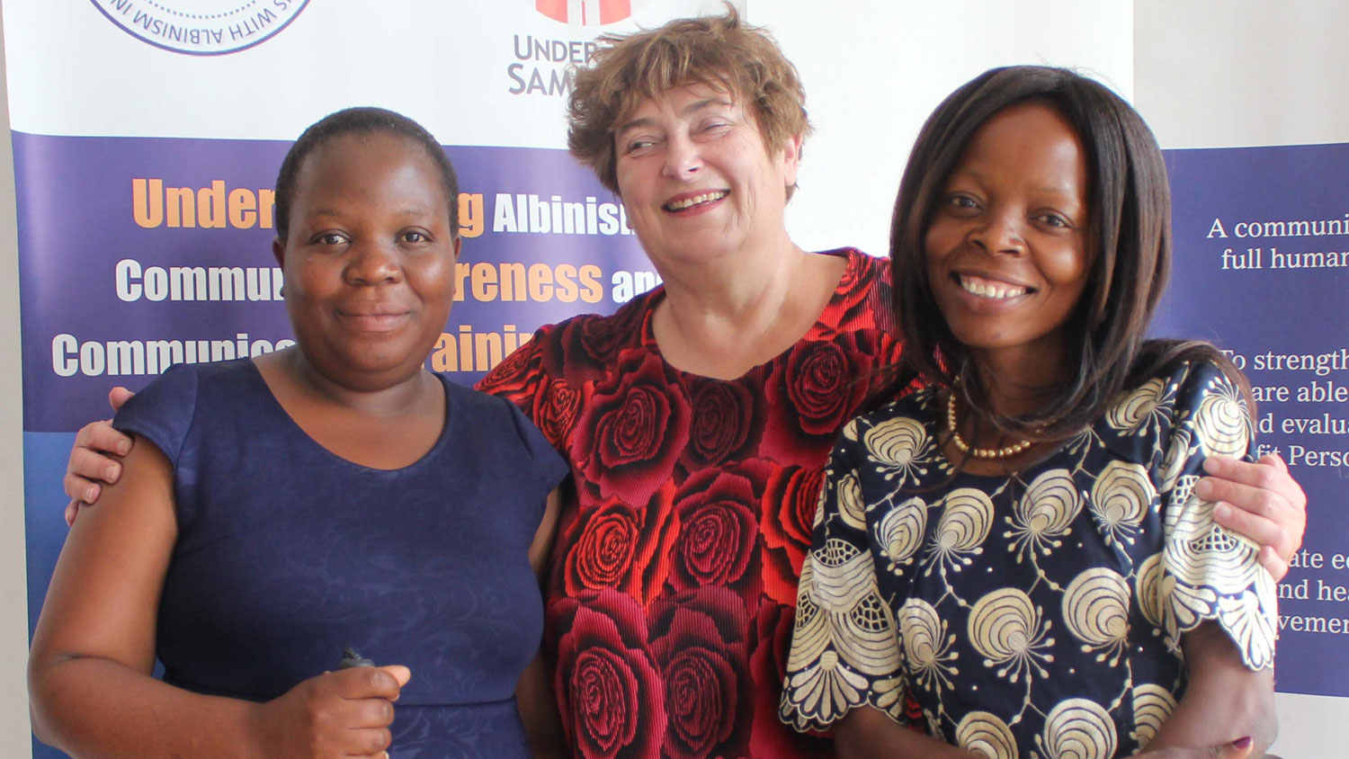 Penny stands with fellow blind cooks in Lilongwe, Malawi CREDIT Commander Retired Penny Melville-Brown