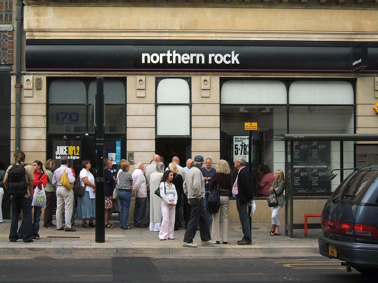 People queuing at a branch of Northern Rock bank in Brighton CREDIT Dominic Alves Wikipedia