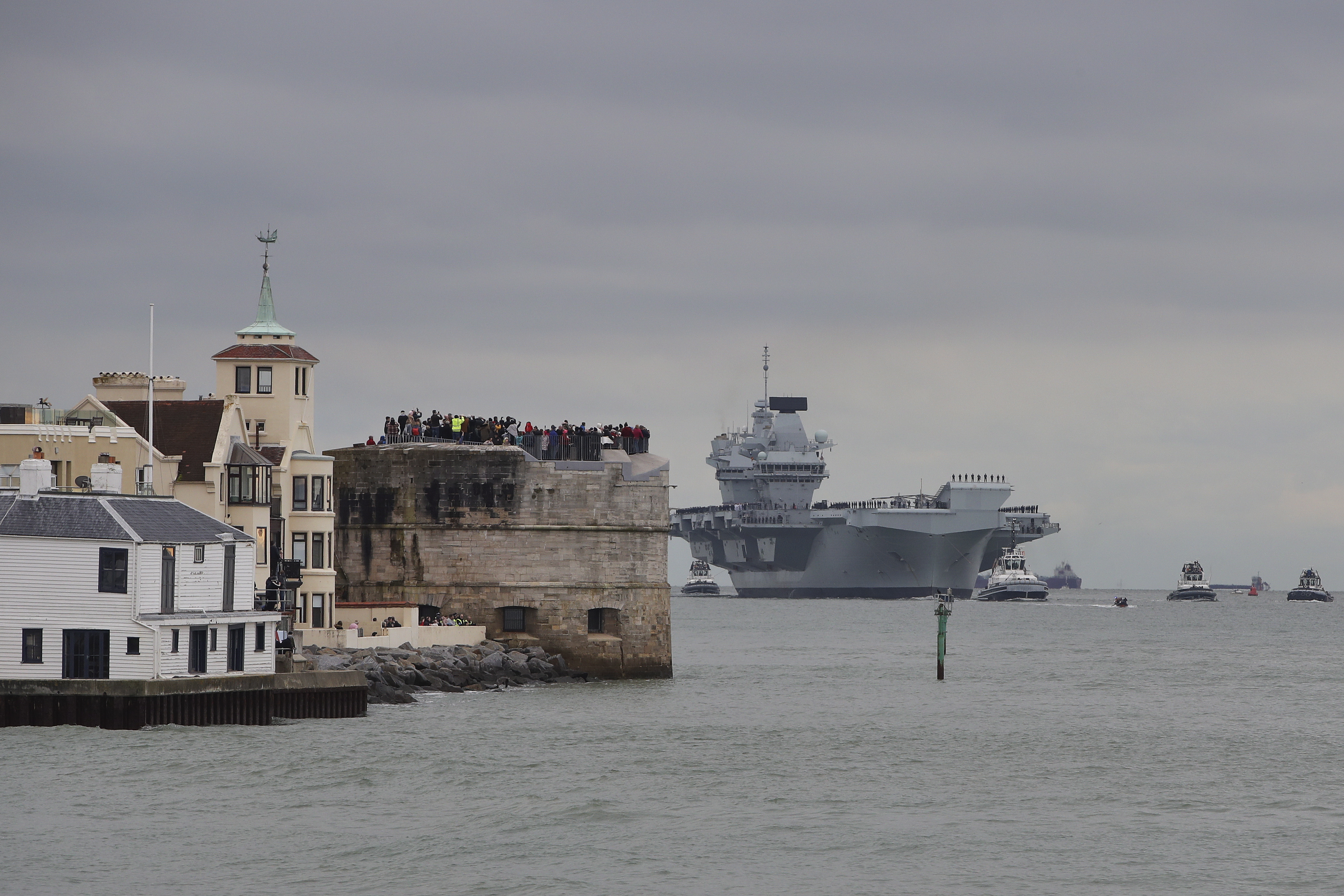 People watch on as HMS Prince of Wales arrives in Portsmouth for the first time (Picture: Royal Navy).