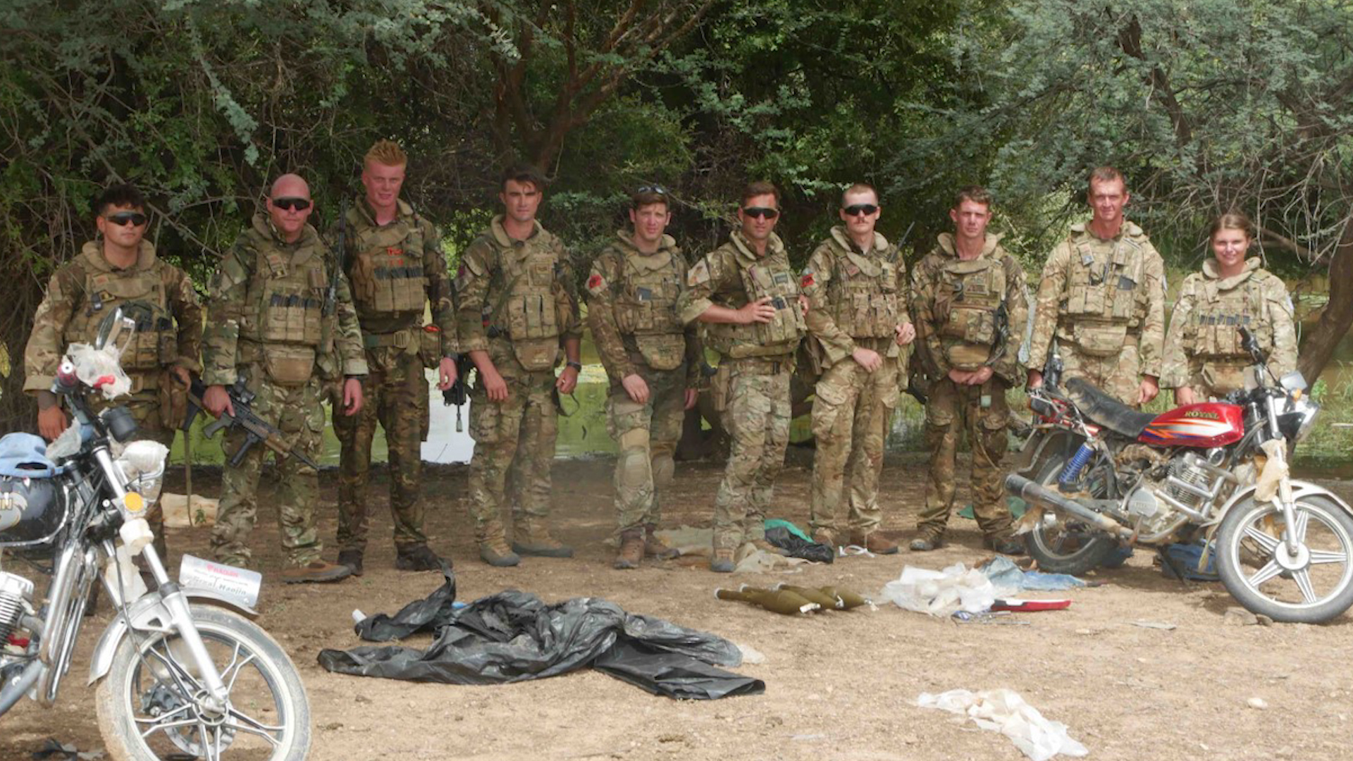 Personnel deployed in Mali alongside weapons and vehicles seized from suspected Islamic State in the Greater Sahara militants