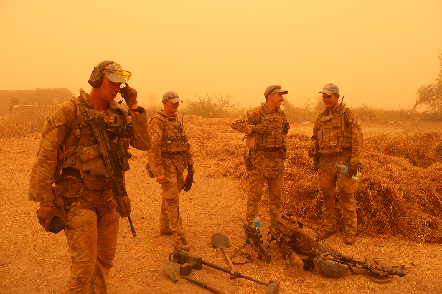 Personnel in Mali conducting an operation that seized a weapons cache from an IS-affiliated group in the country