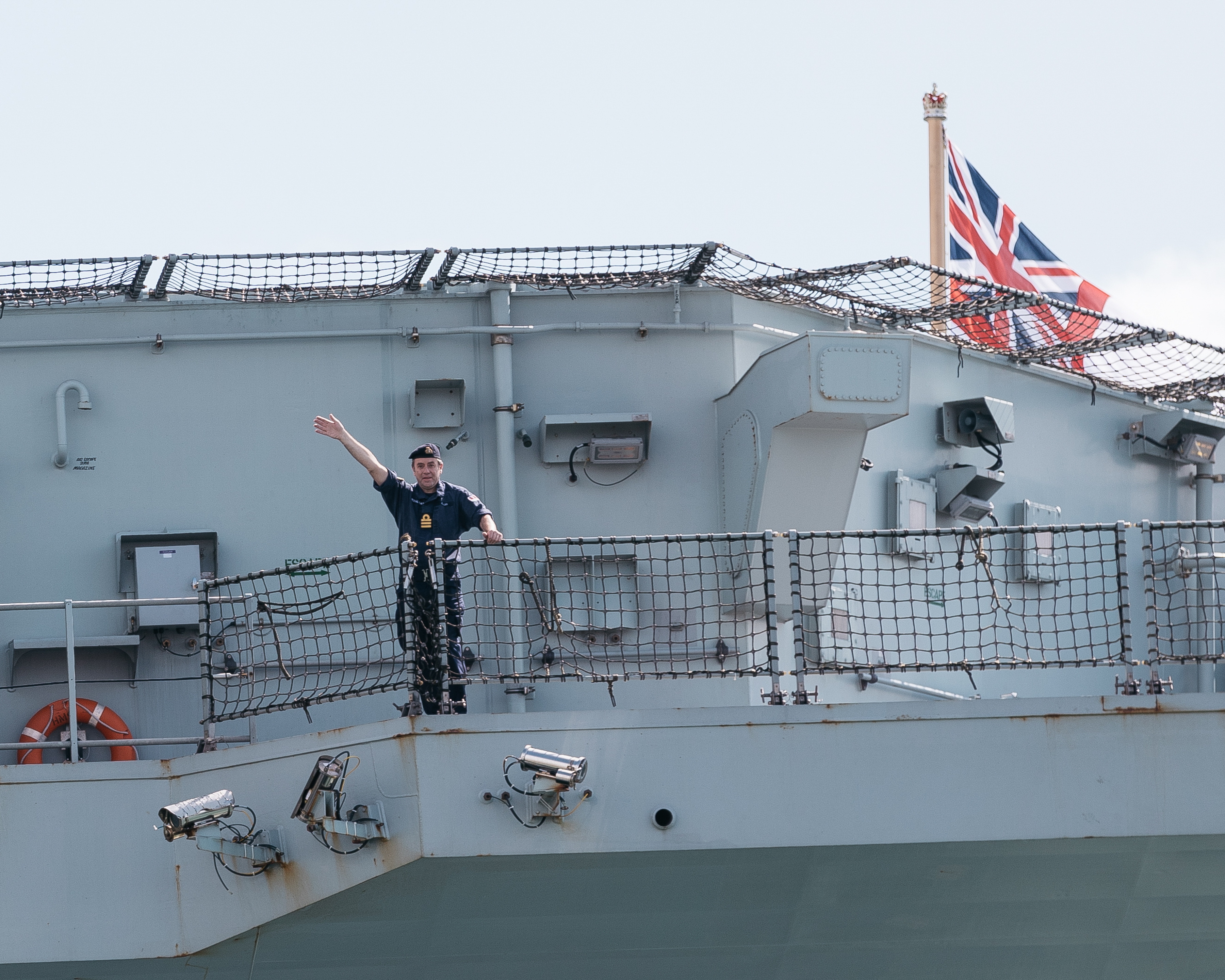 Personnel on board waved to loved ones as the ship arrived home (Picture: MOD).