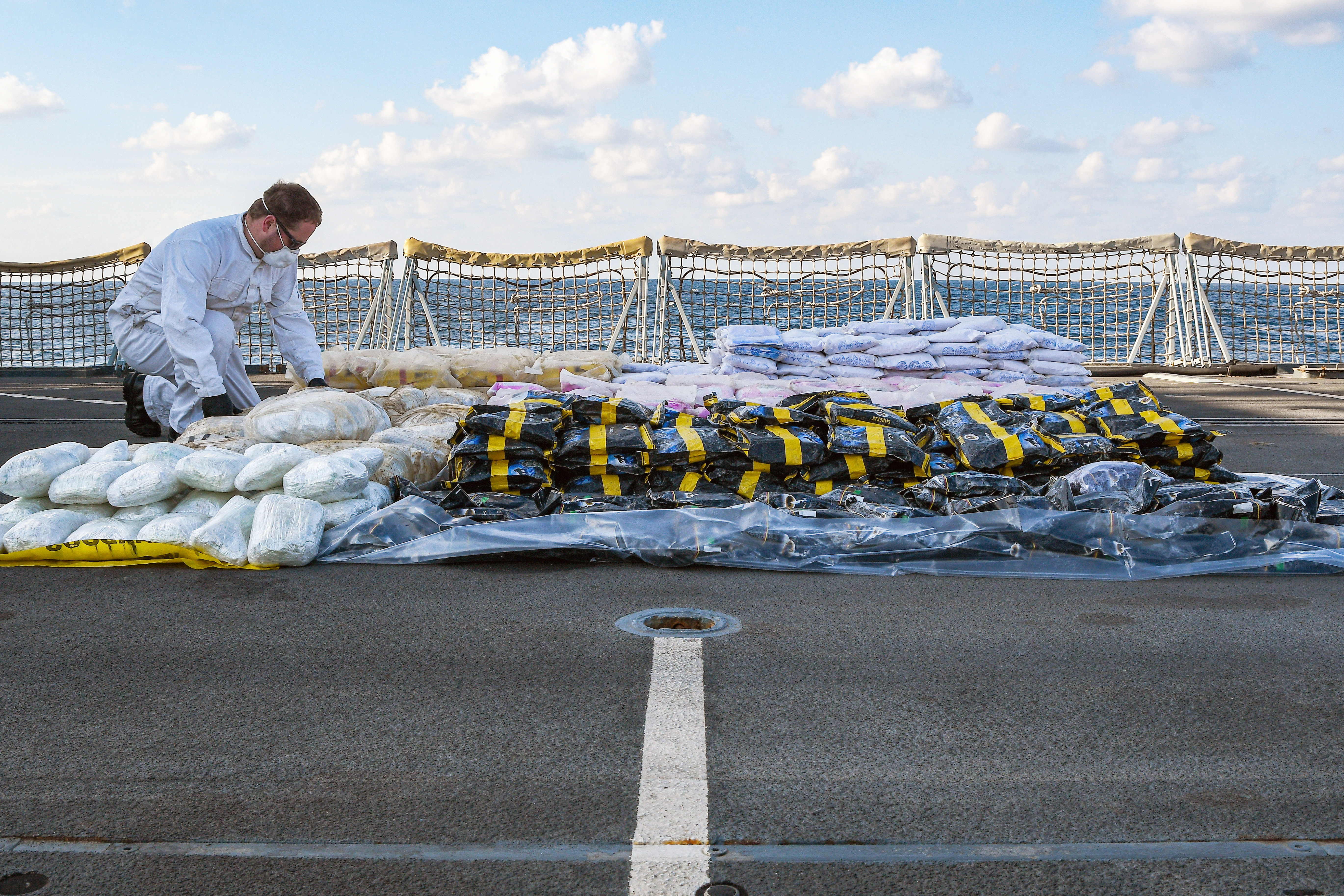 Personnel on board HMS Montrose inspected a drug haul, worth nearly £15 million, in the Gulf of Oman 