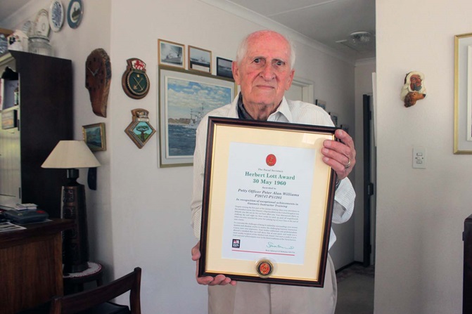 Petty Officer Peter Williams with the award (Picture: Royal Navy).
