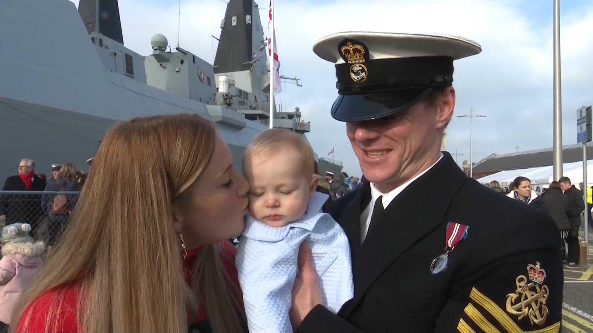 Petty Officer Stephen Gibbons wife his wife and son.