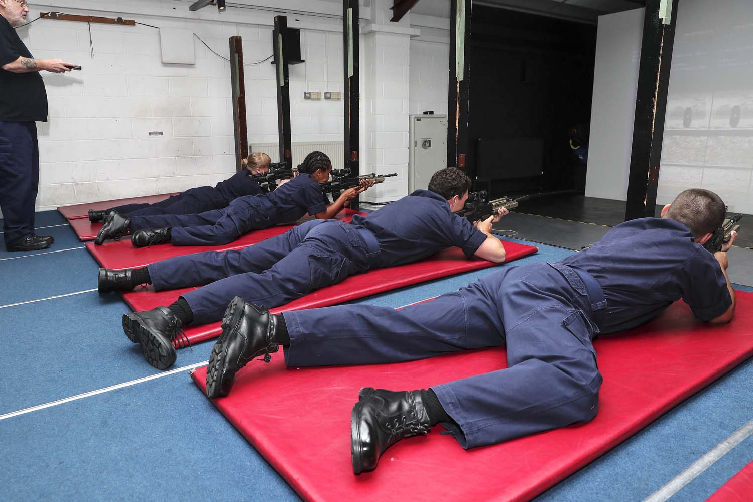Phase 1.5 Trainees use practice scenarios with laser and digital technology at the Disomounted Combat trainer range at HMS Excellent 300720 CREDIT ROYAL NAVY.jpg