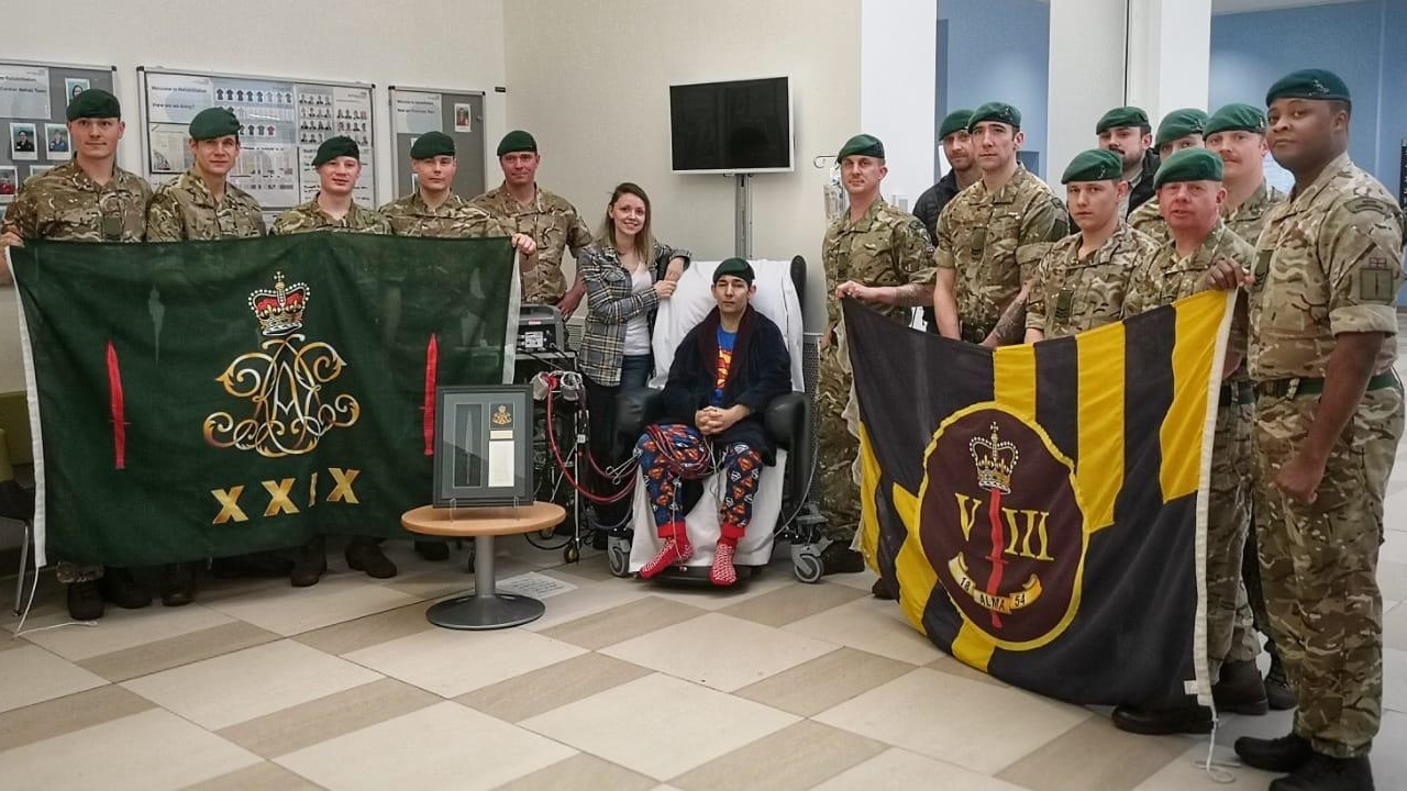 Phill's former Army Commando regiment surprised him with a visit and gifts before his heart transplant surgery (Picture: Royal Papworth Hospital).